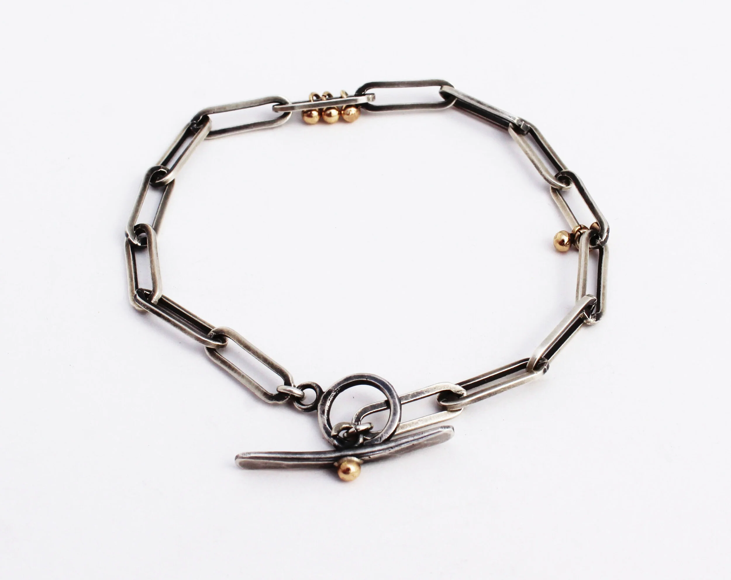 Silver Paperclip Bracelet with 14k Solid Gold.