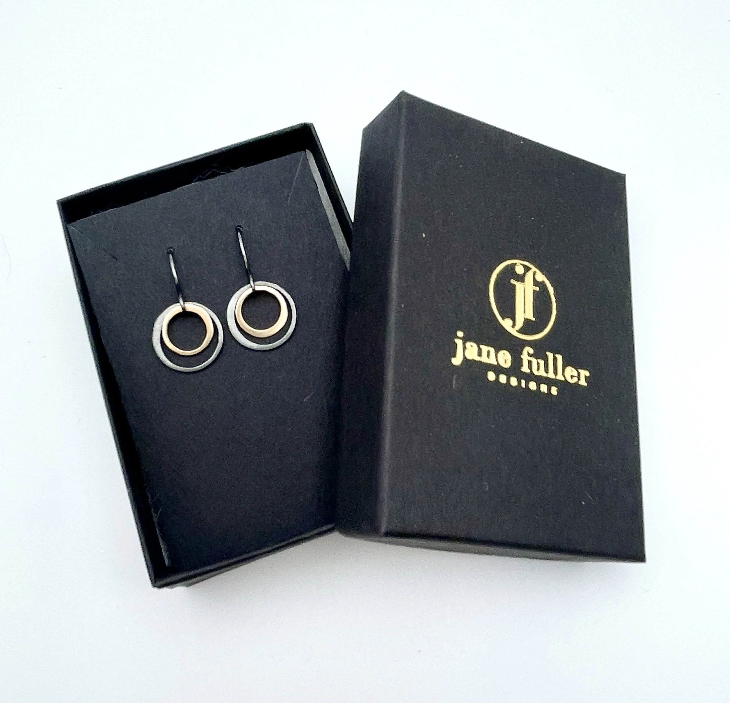 Silver and gold hoop earrings3.jpg