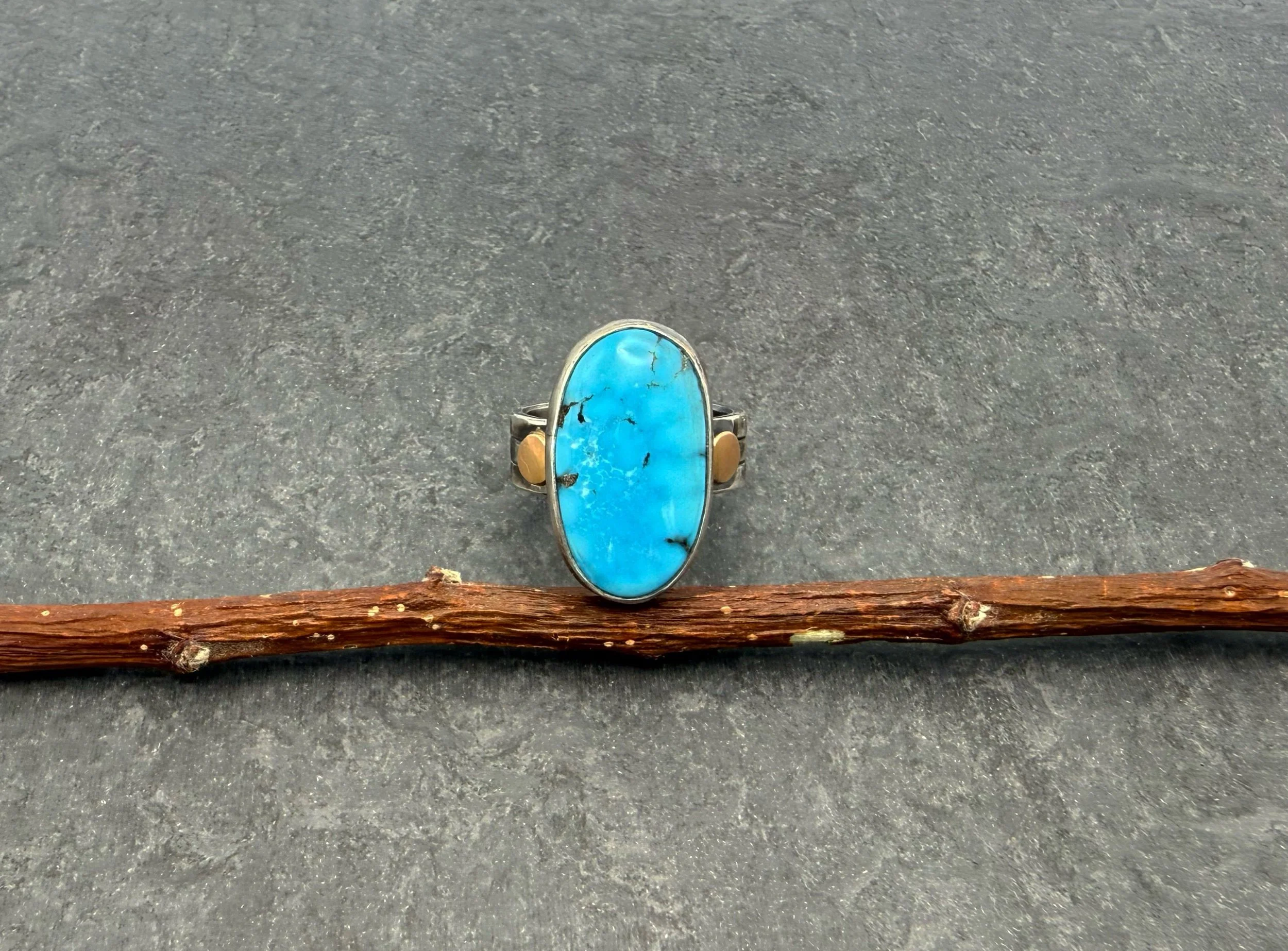 Silver kingman turquoise ring with gold accents