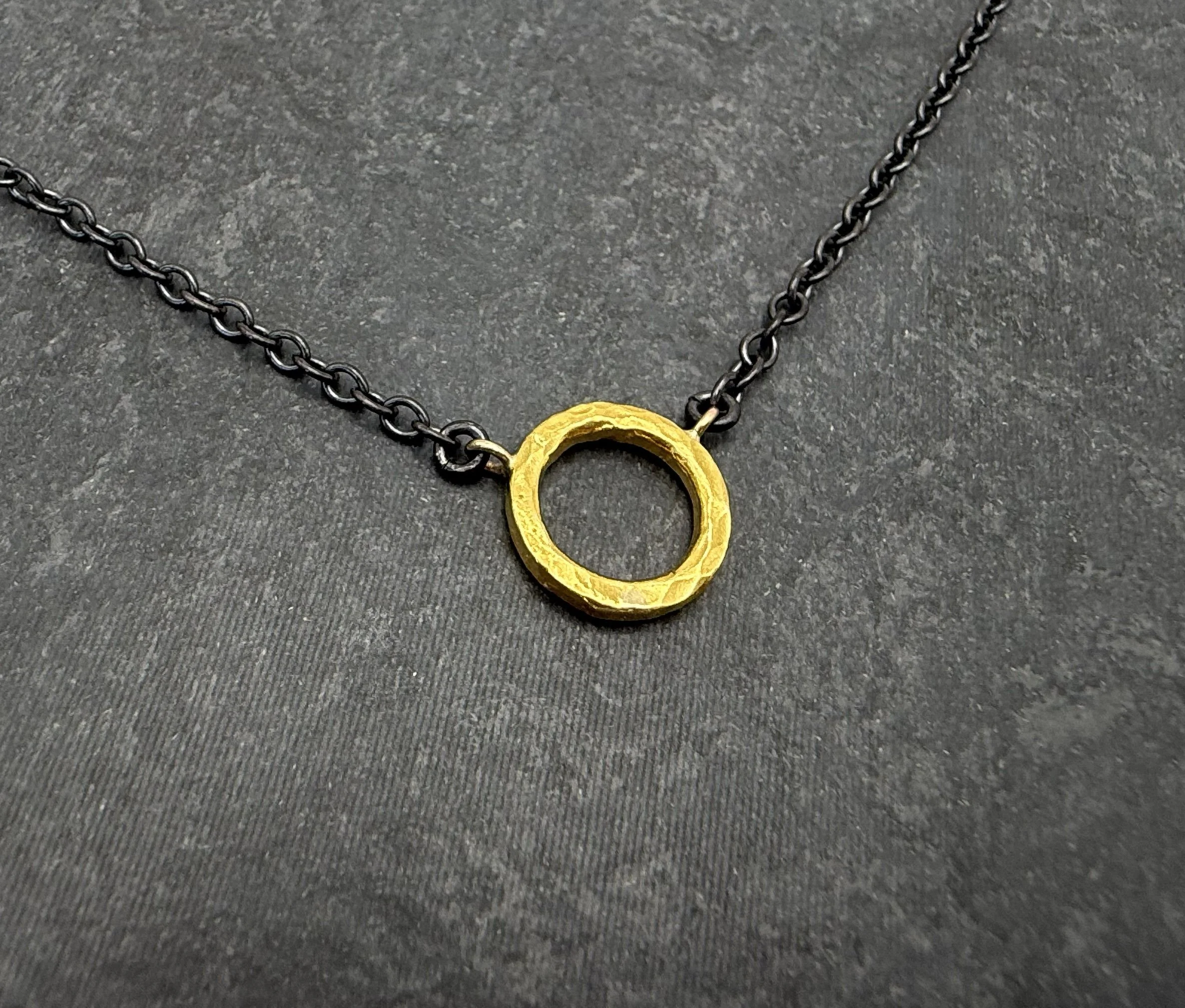 Hammered rustic gold circle necklace with silver chain