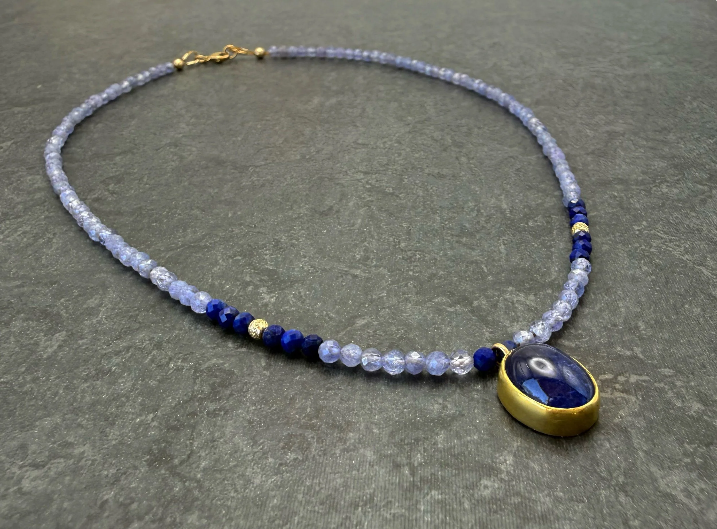 22k gold tanzanite necklace with purple tanzanite beads