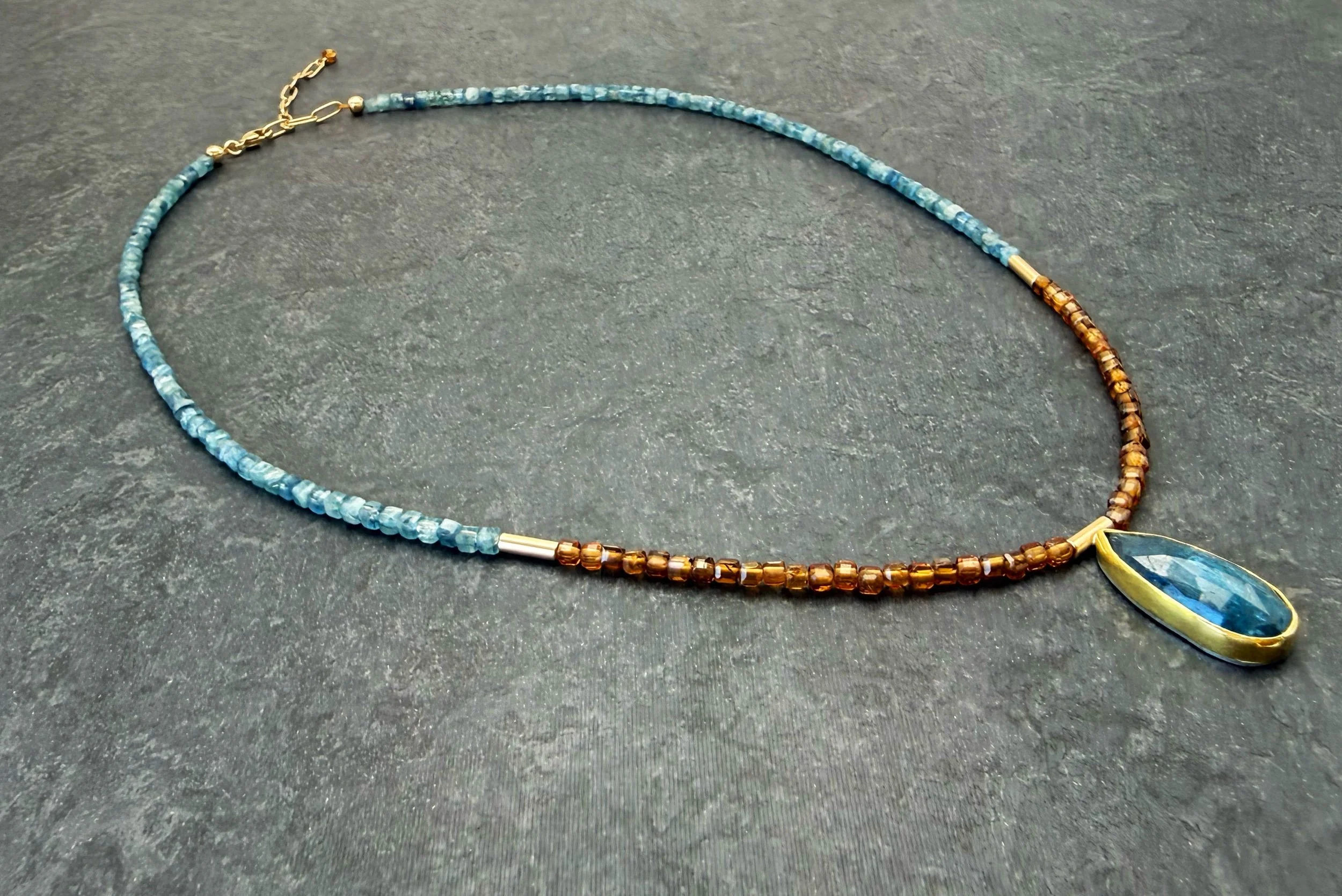 blue kyanite necklace in 14k and 22k gold