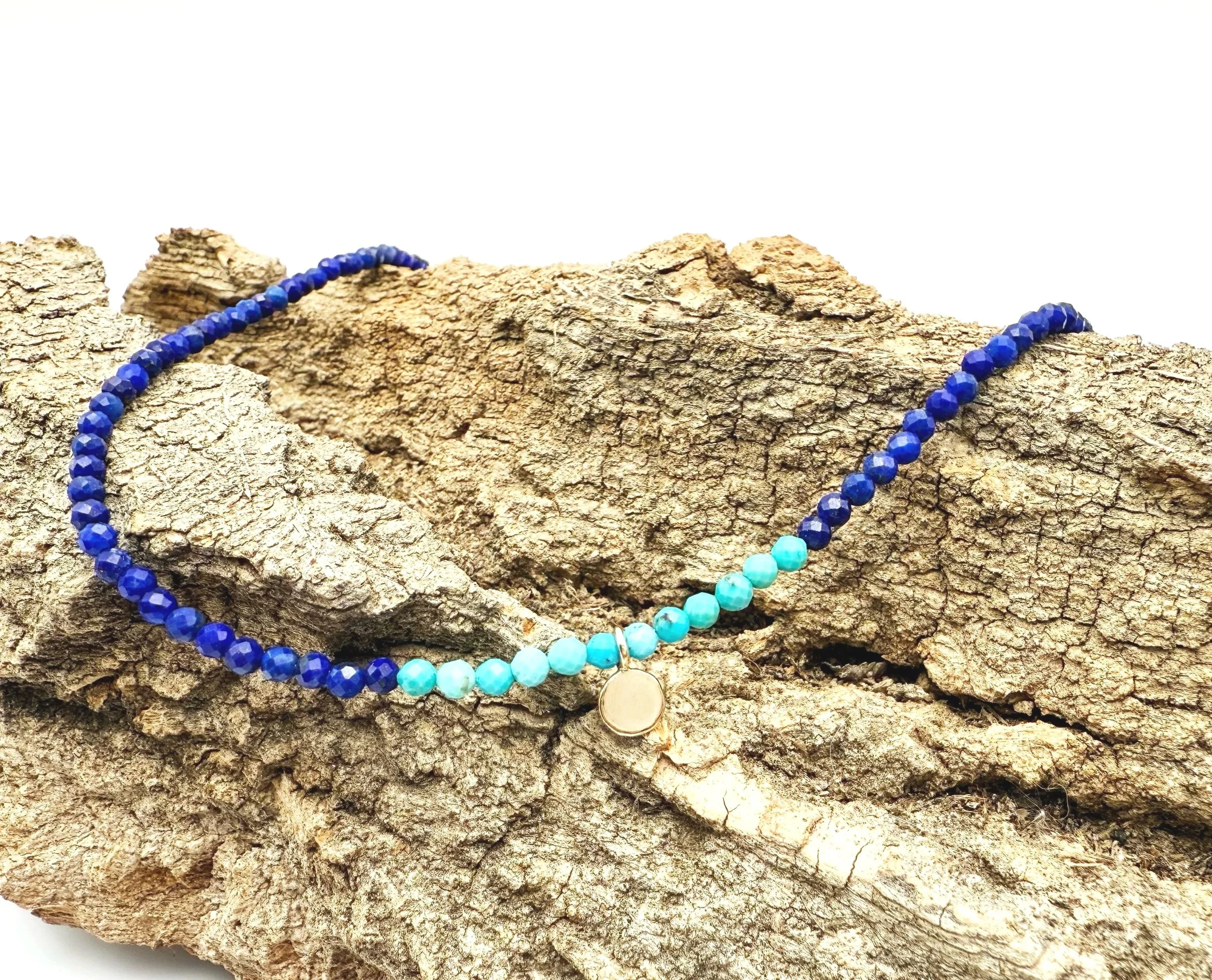 lapis lazuli and turquoise beaded necklace with gold disc pendant