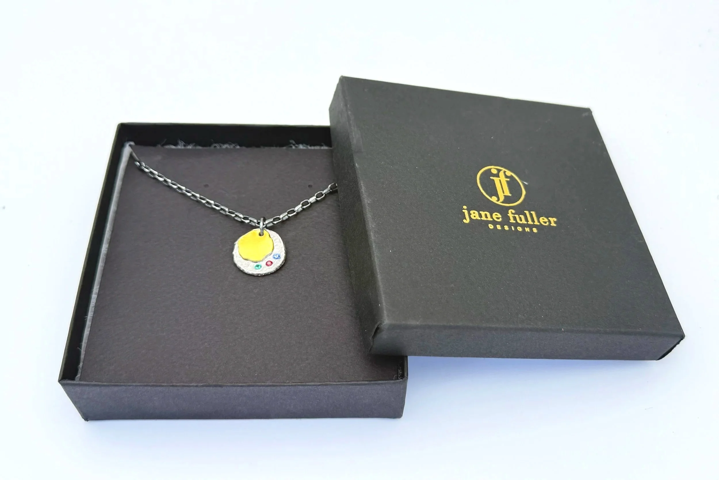 Birthstone disc necklace in a Jane Fuller Designs gift box