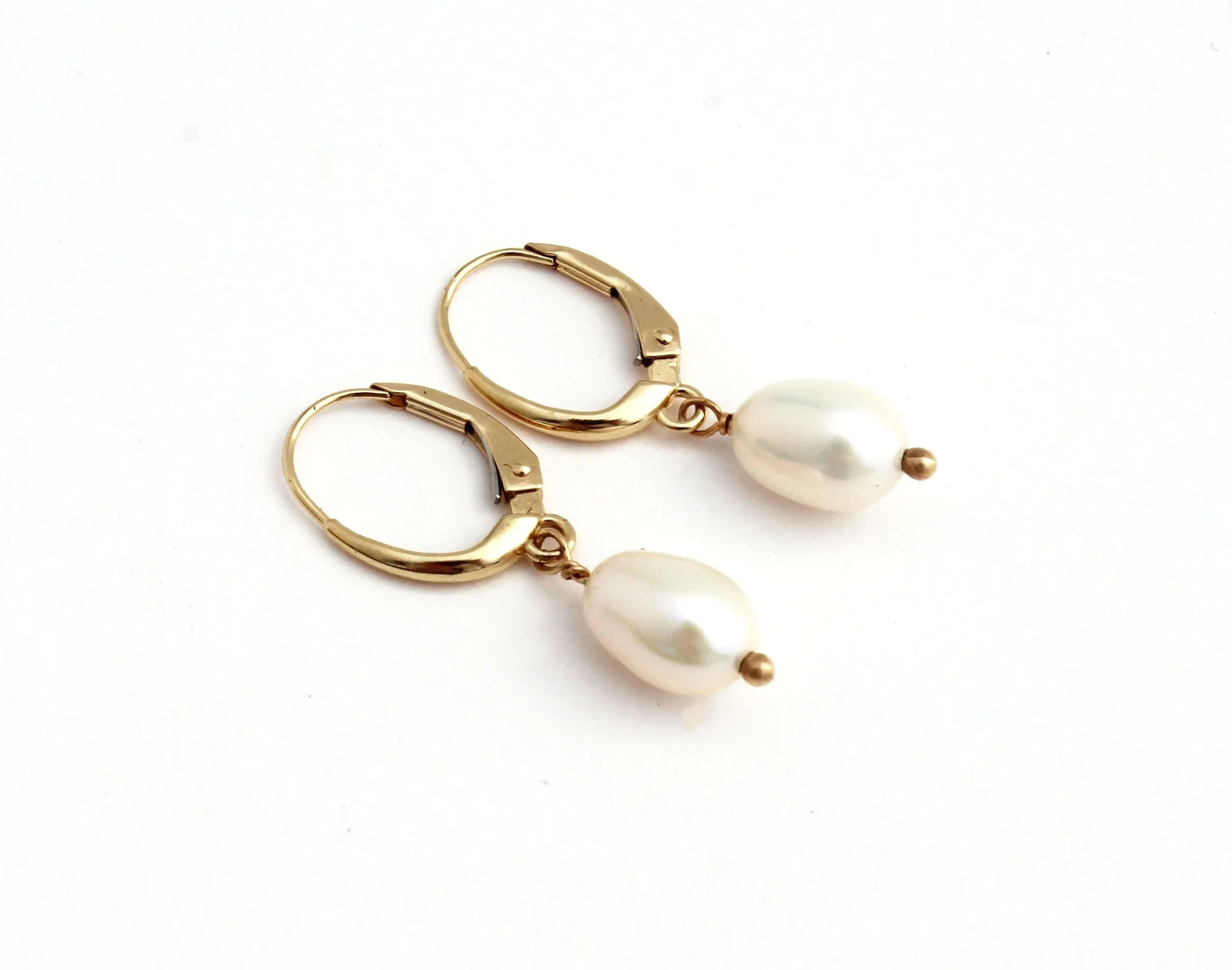 large white freshwater pearl earrings in 14k solid gold