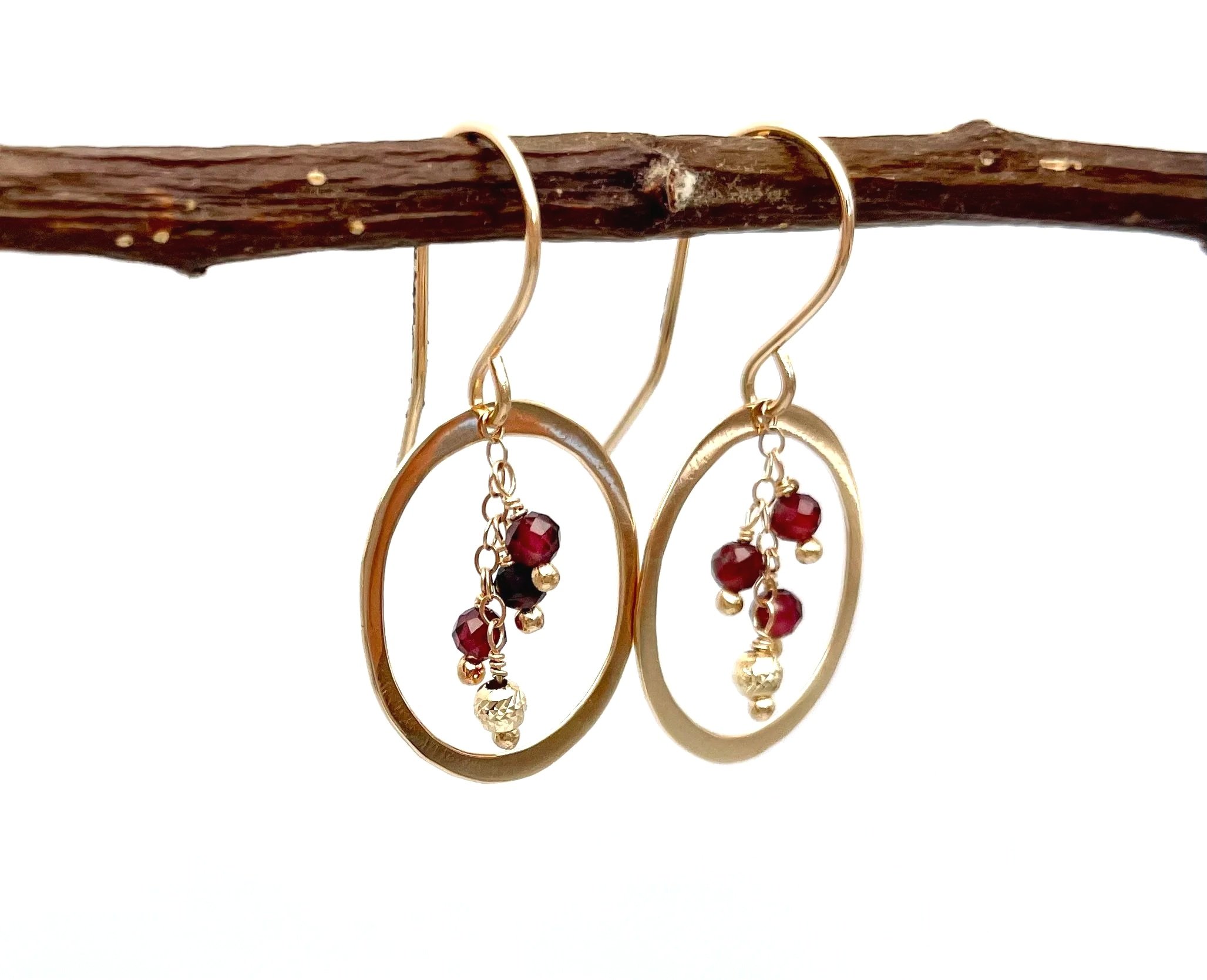 large dangle hoop earrings with burgundy garnet gemstones