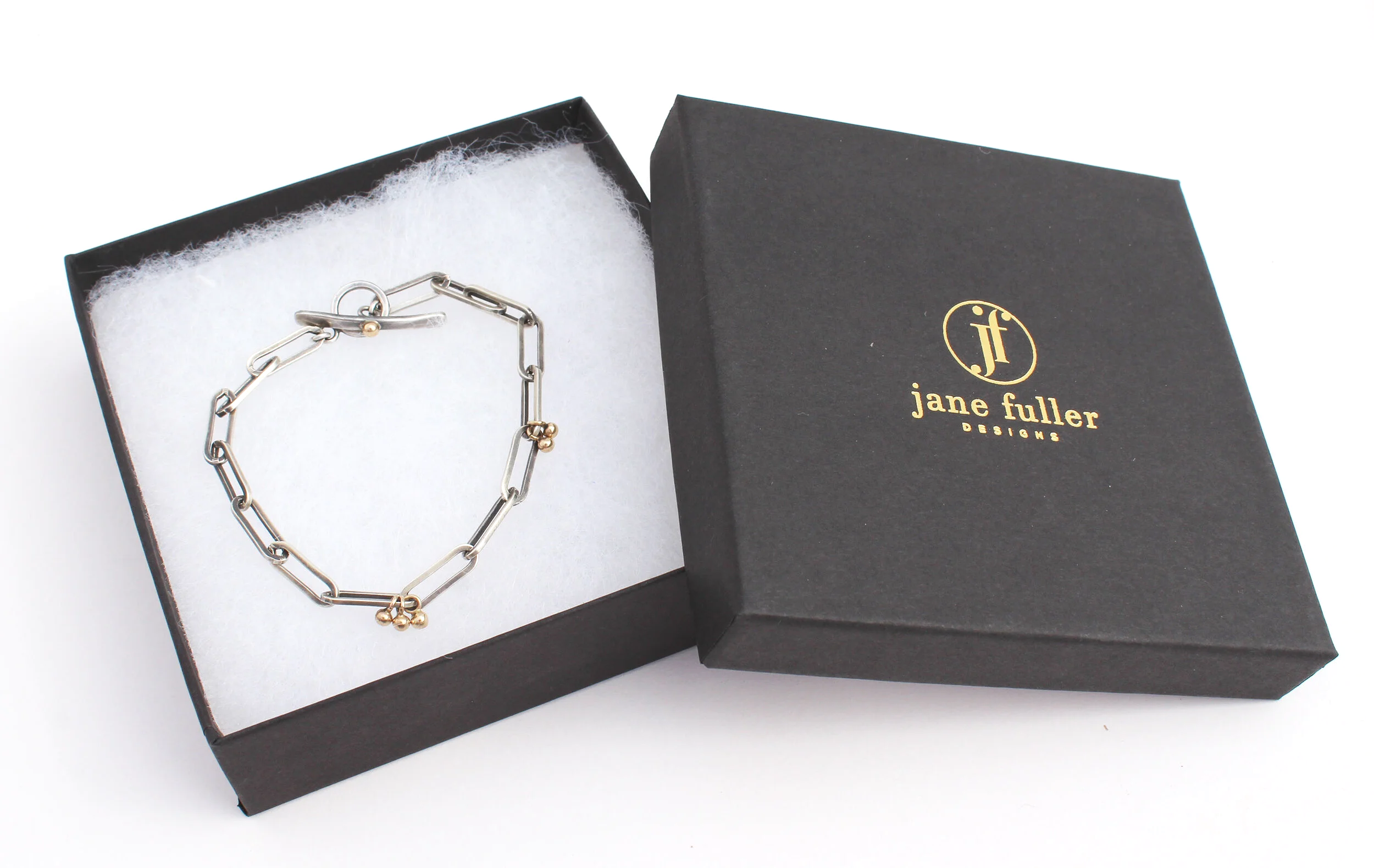 handmade unique chain bracelet in silver and gold