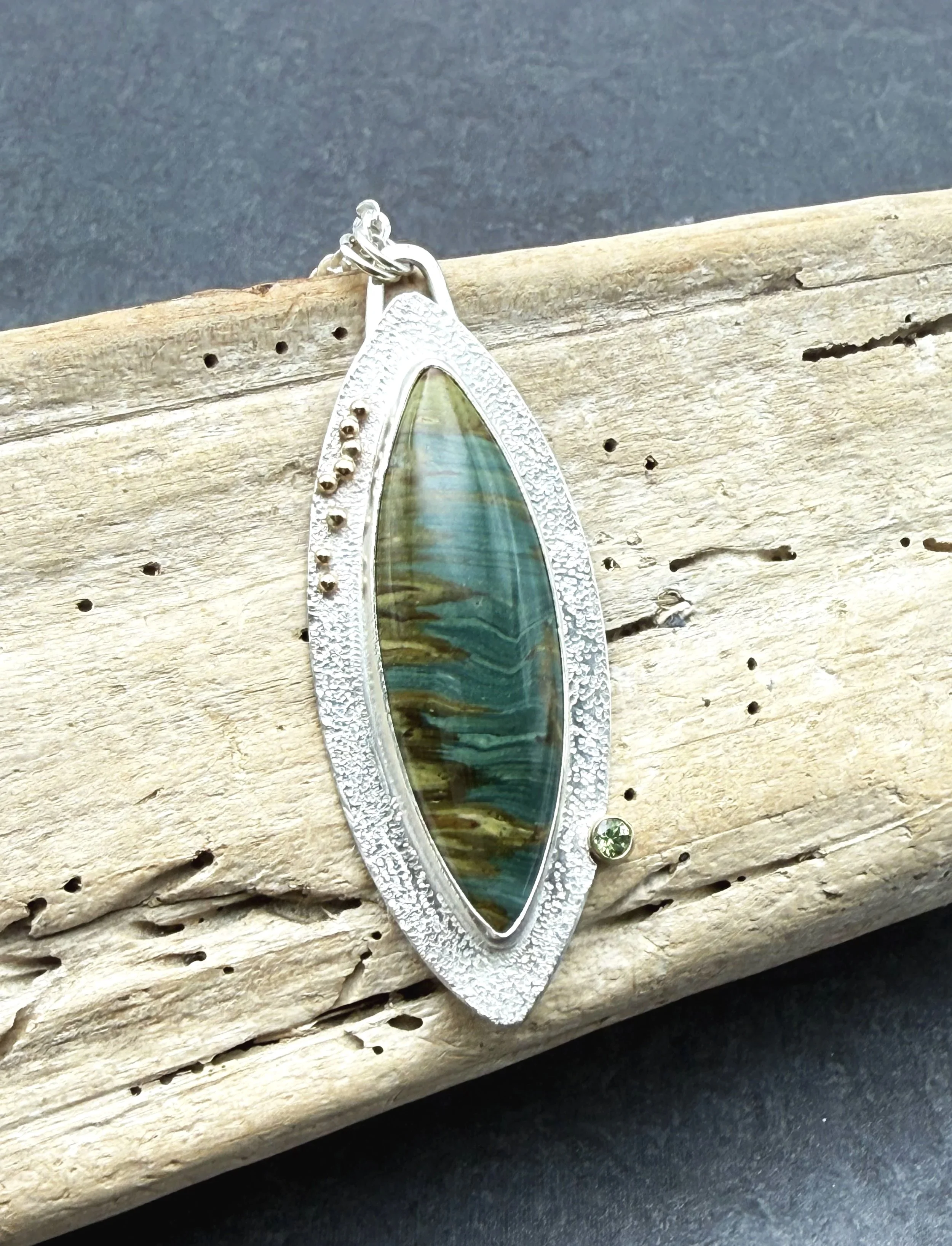 Large green stone pendant necklace silver and gold