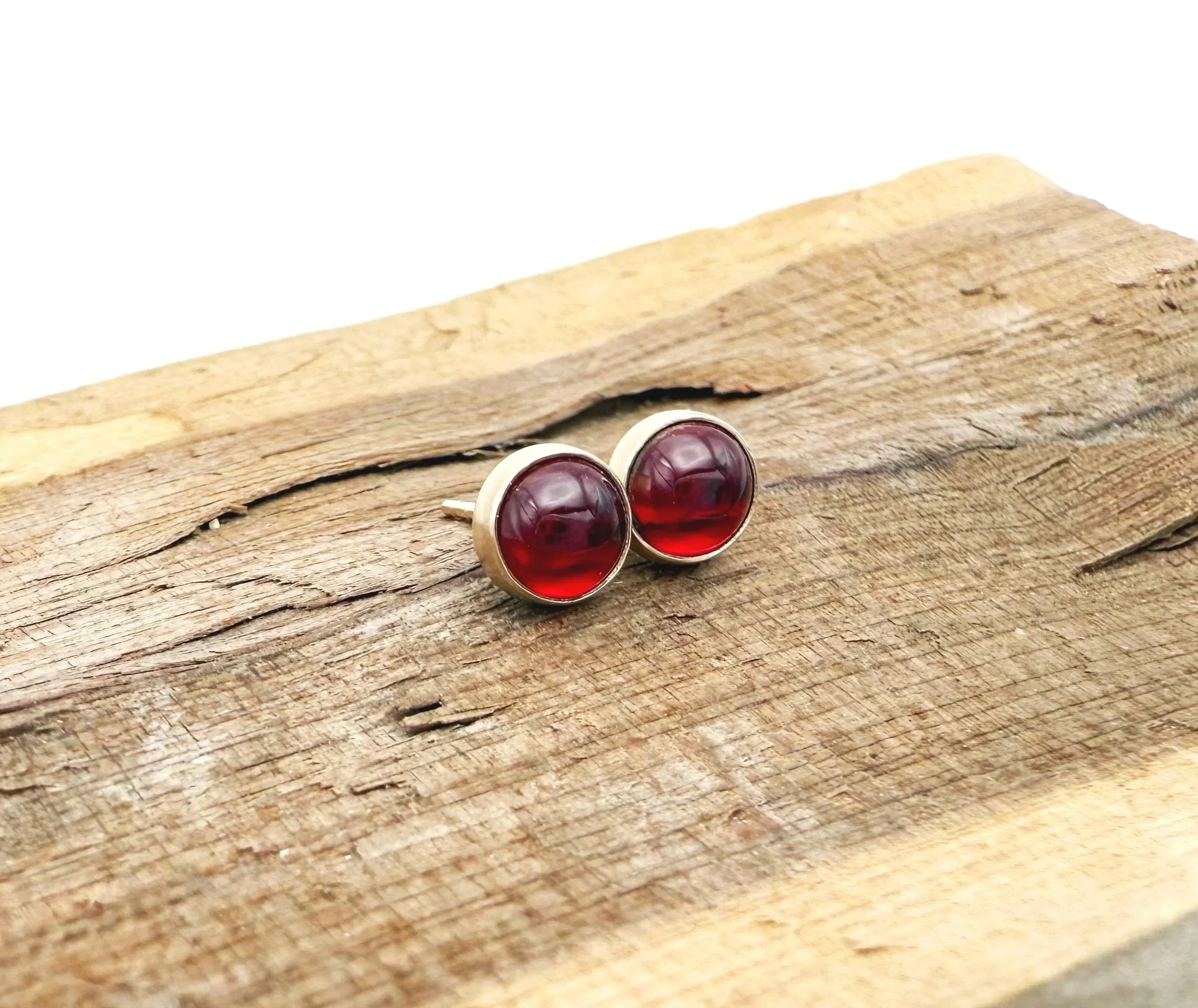 gold lab grown ruby stud earrings 14k
