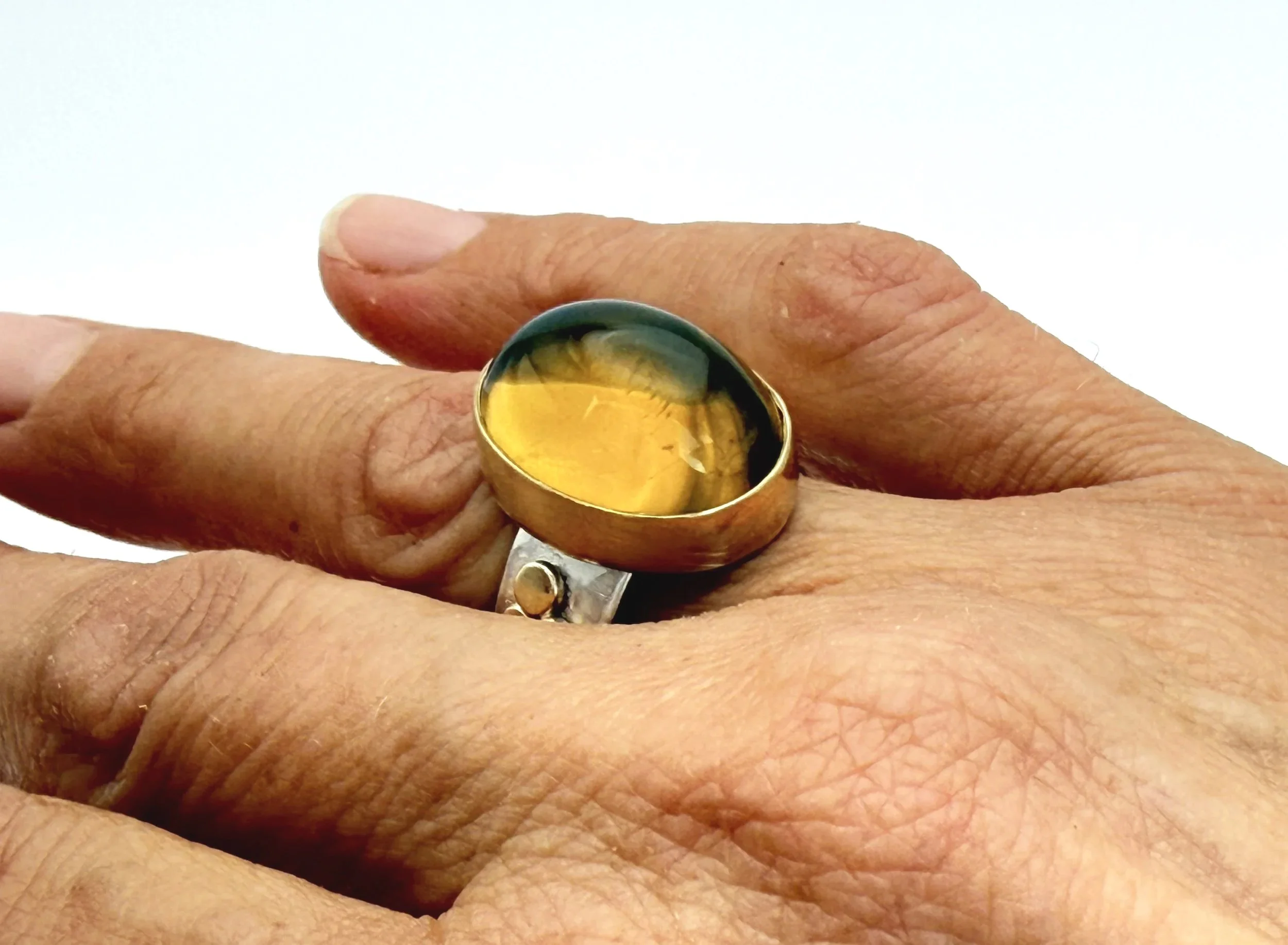 Large citrine ring worn on a hand, US size 7