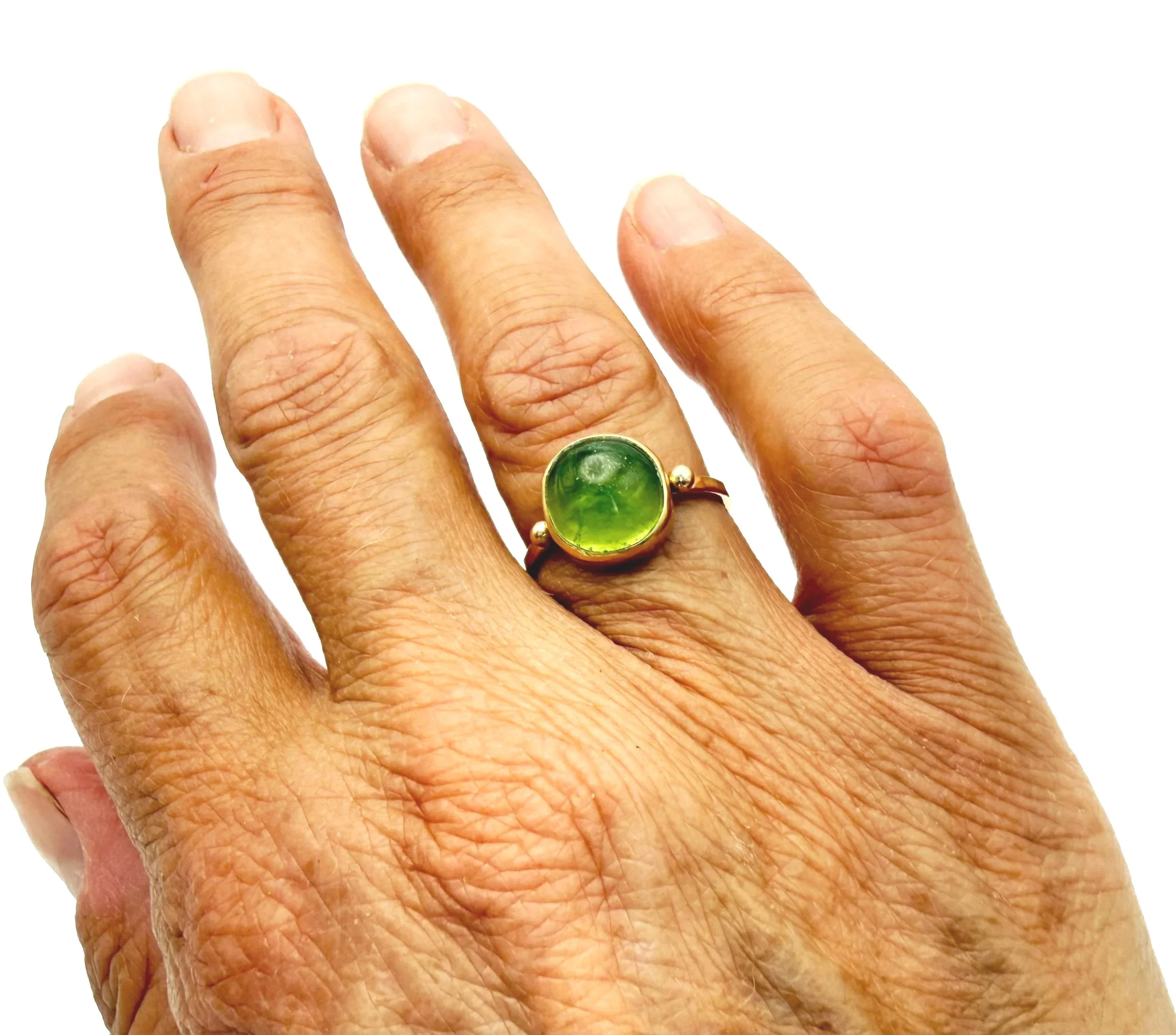 large peridot stone bezel set in 14k solid gold