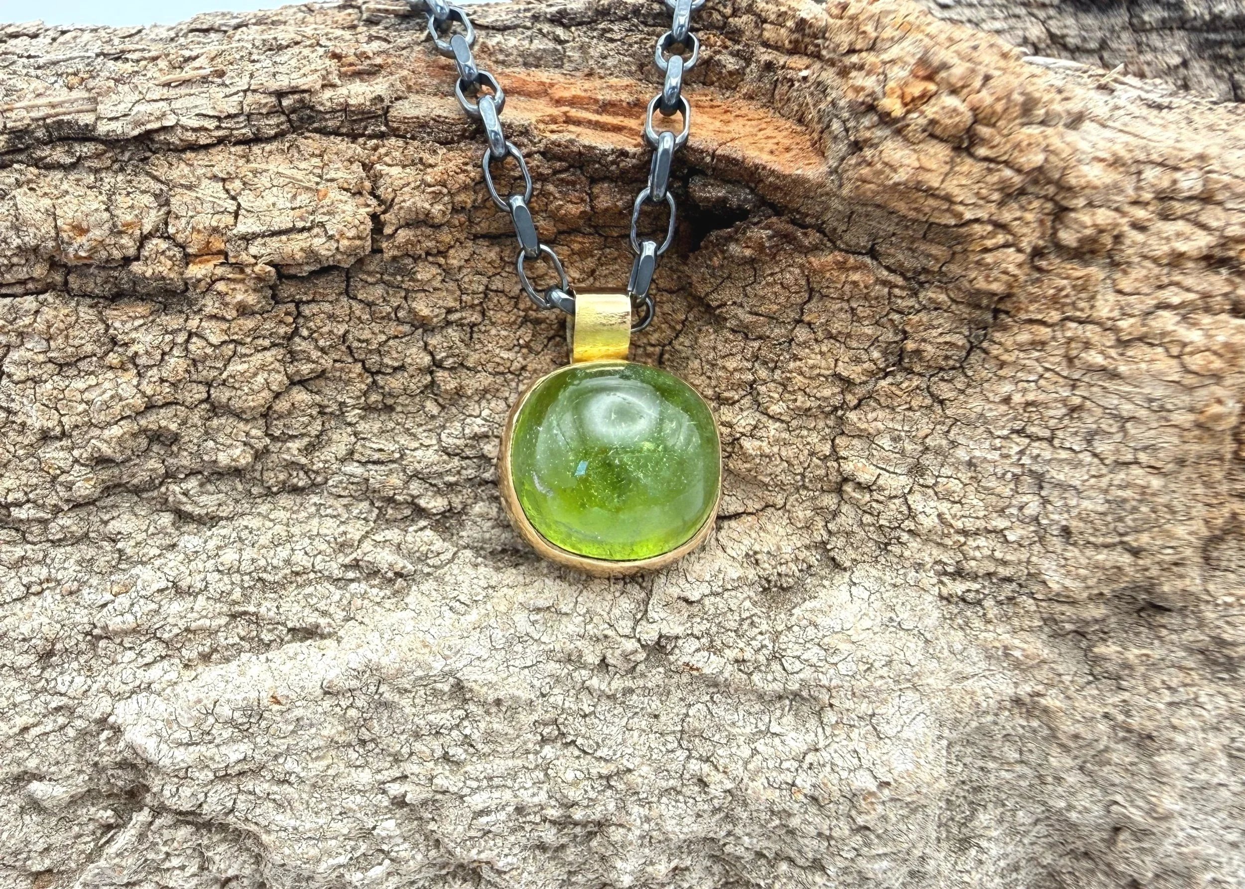 handmade smooth round peridot pendant with silver chain