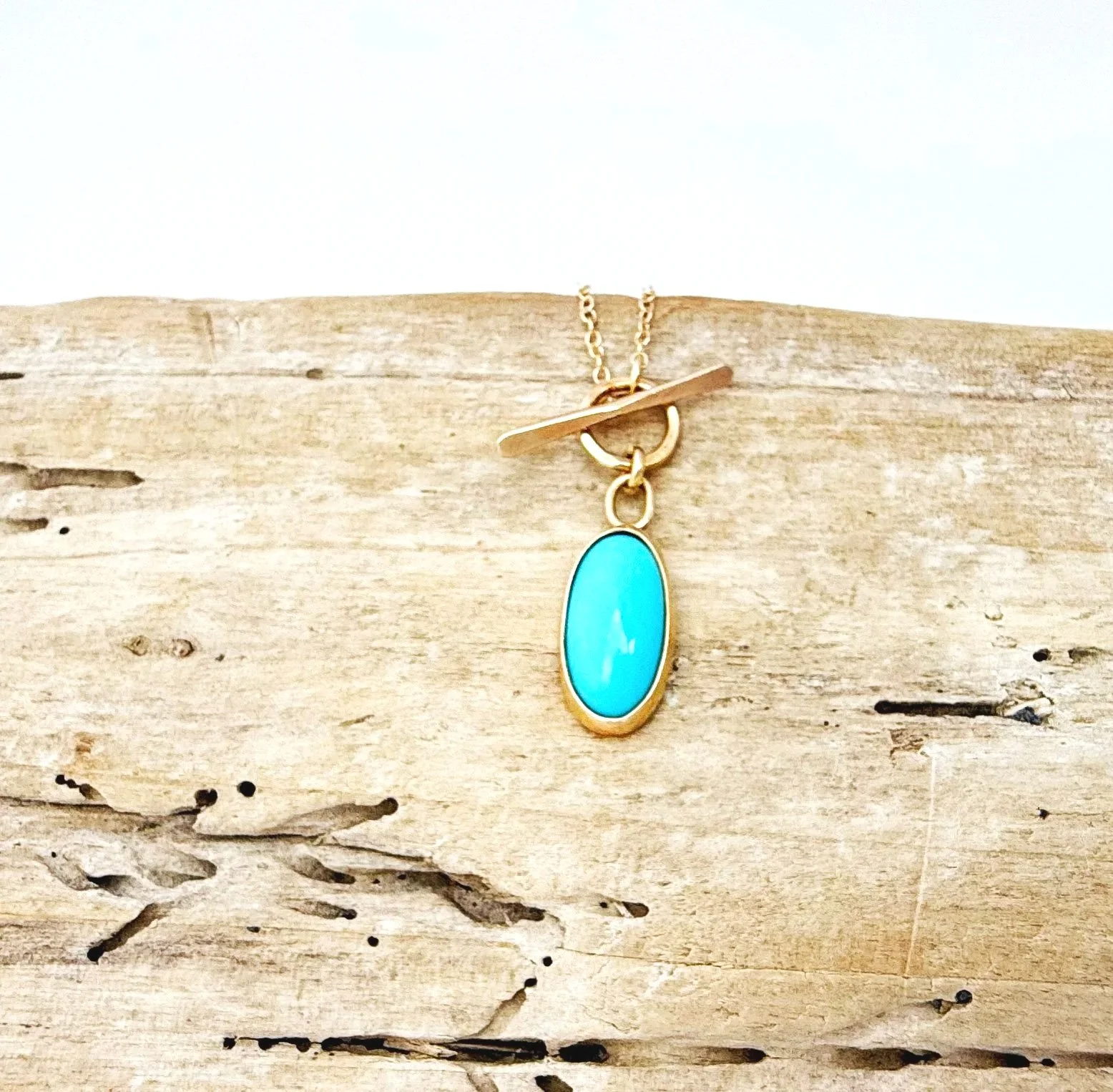 gold turquoise pendant with front toggle clasp