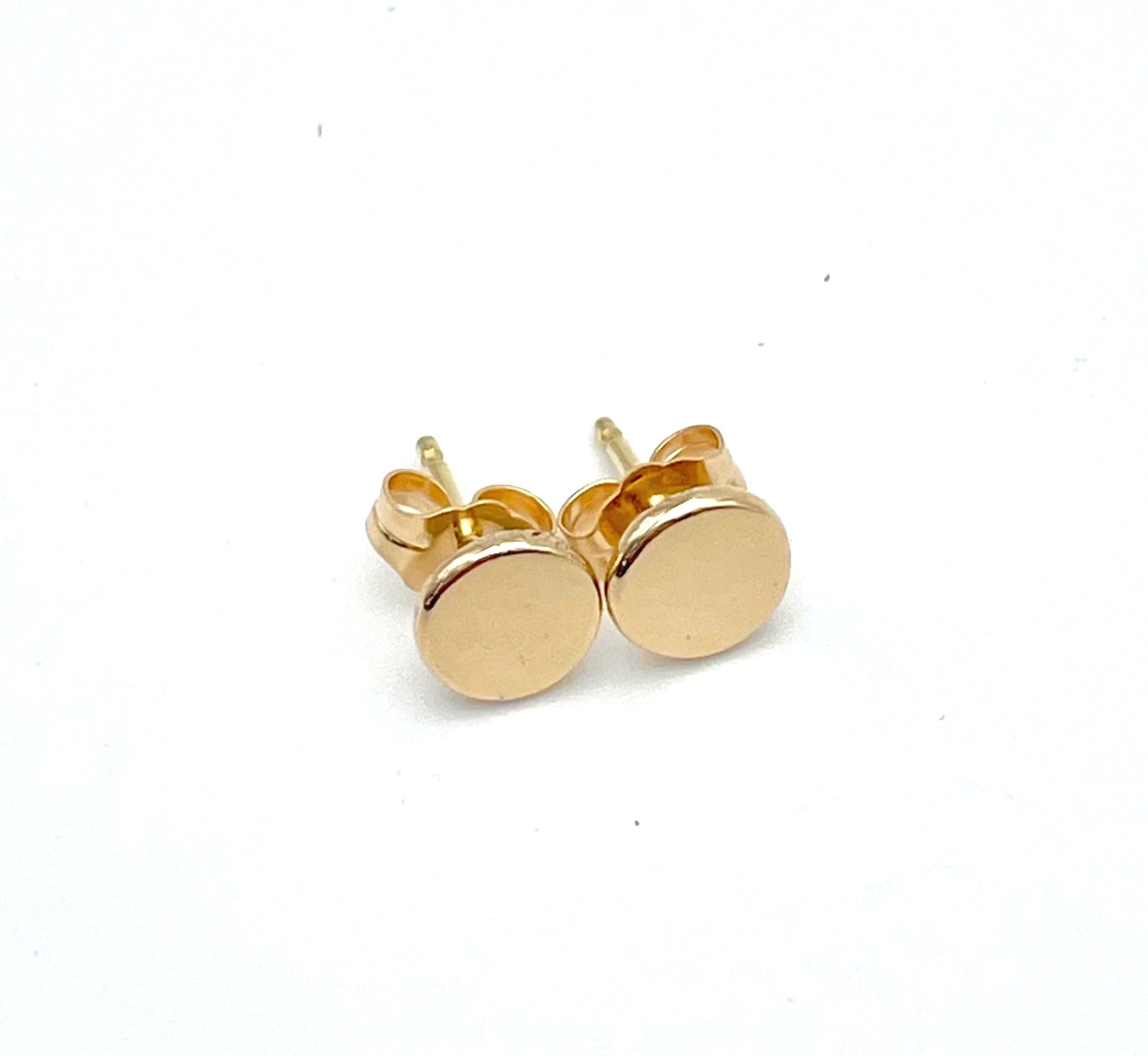 18k gold flat round studs with butterfly back