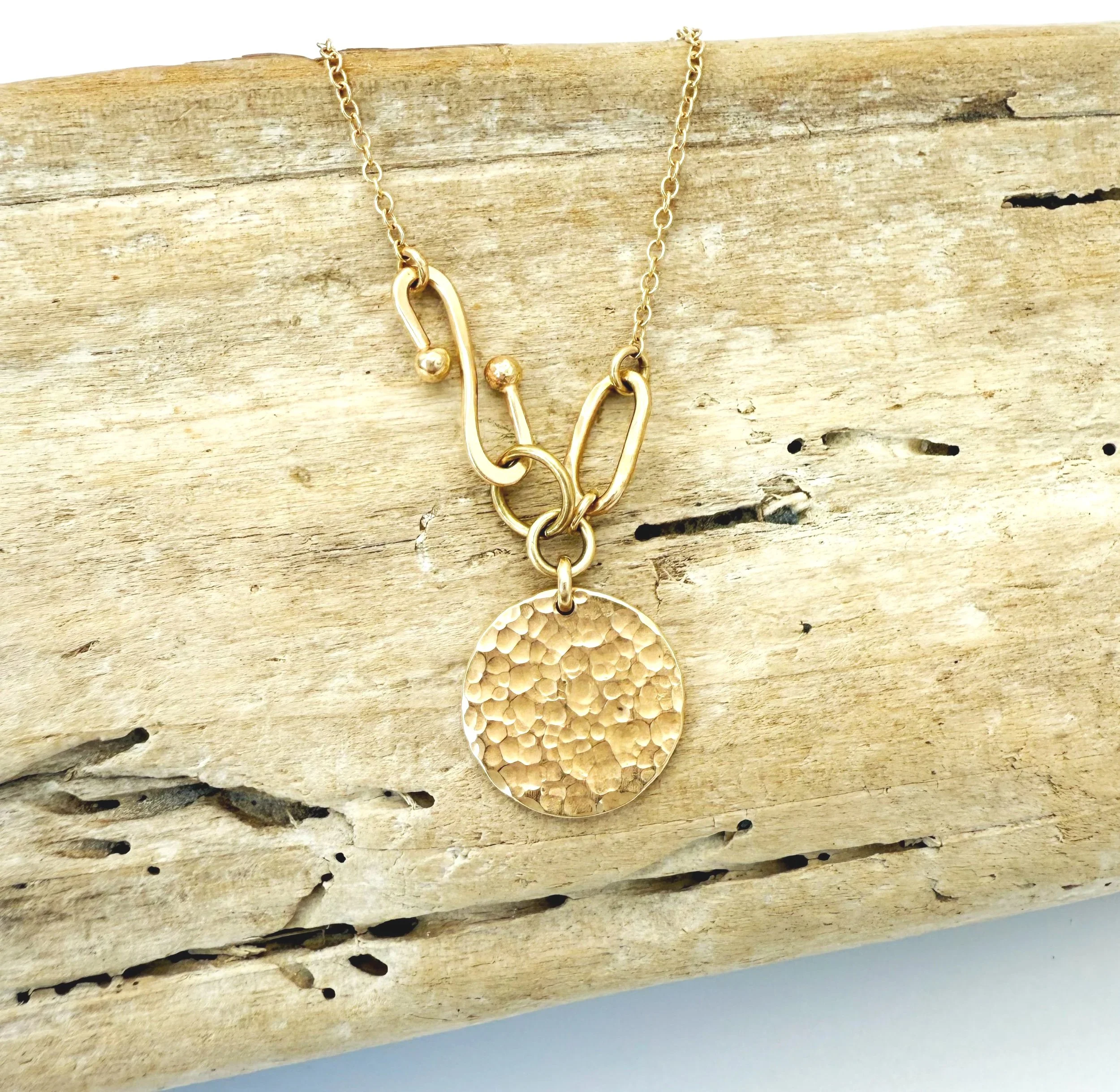 artisan made hammered disc pendant necklace in 14k gold