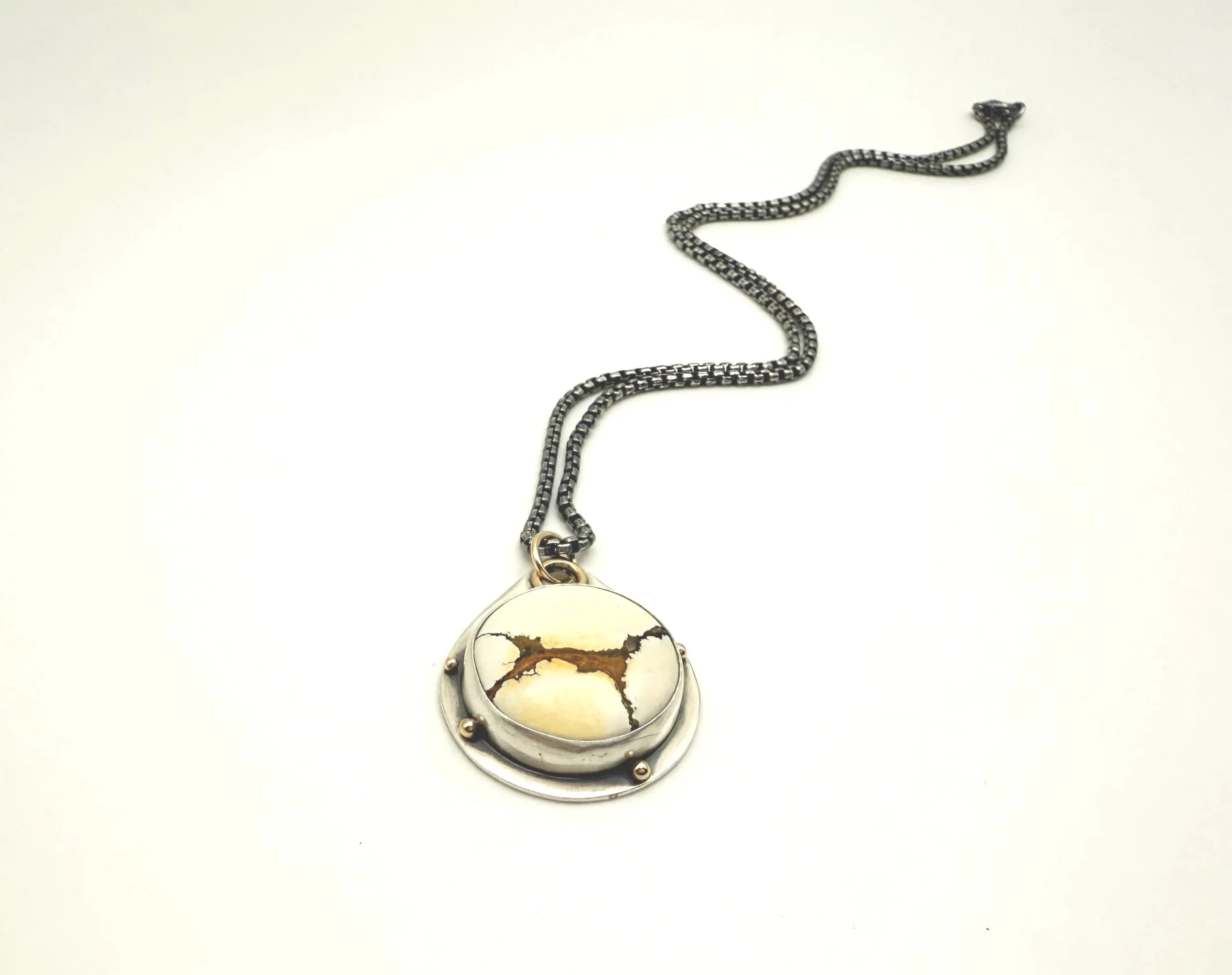 artisan one of a kind pendant necklace in oxidized silver and 14k gold