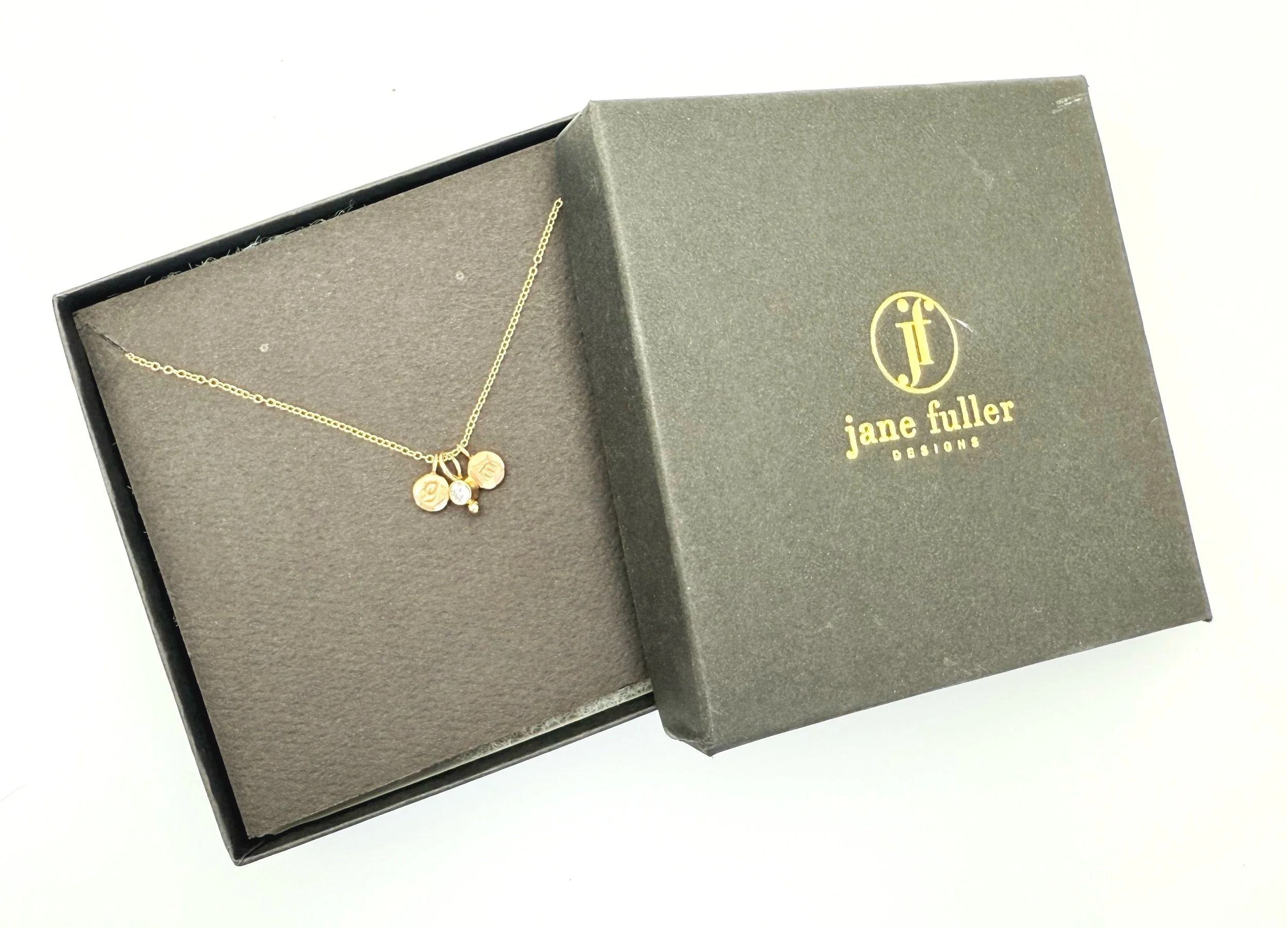 lower case initial stamped discin 14k solid gold with diamond solitaire