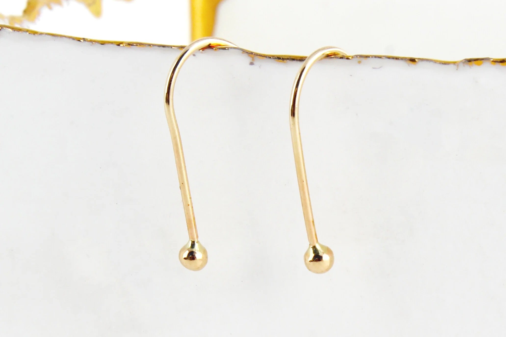 gold open hoop earrings with end dot 14k