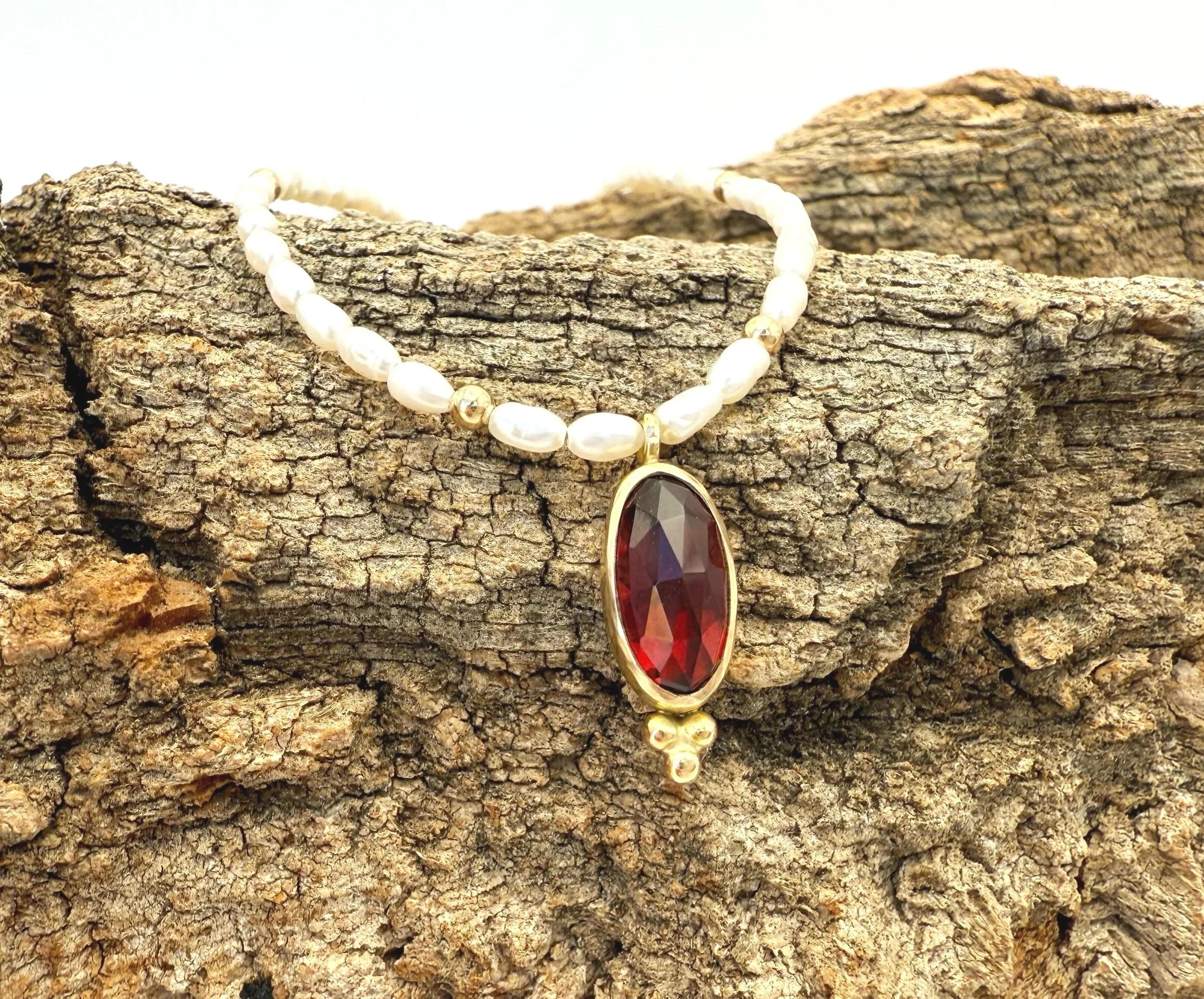 one of a kind bezel set garnet pendant necklace 14k gold