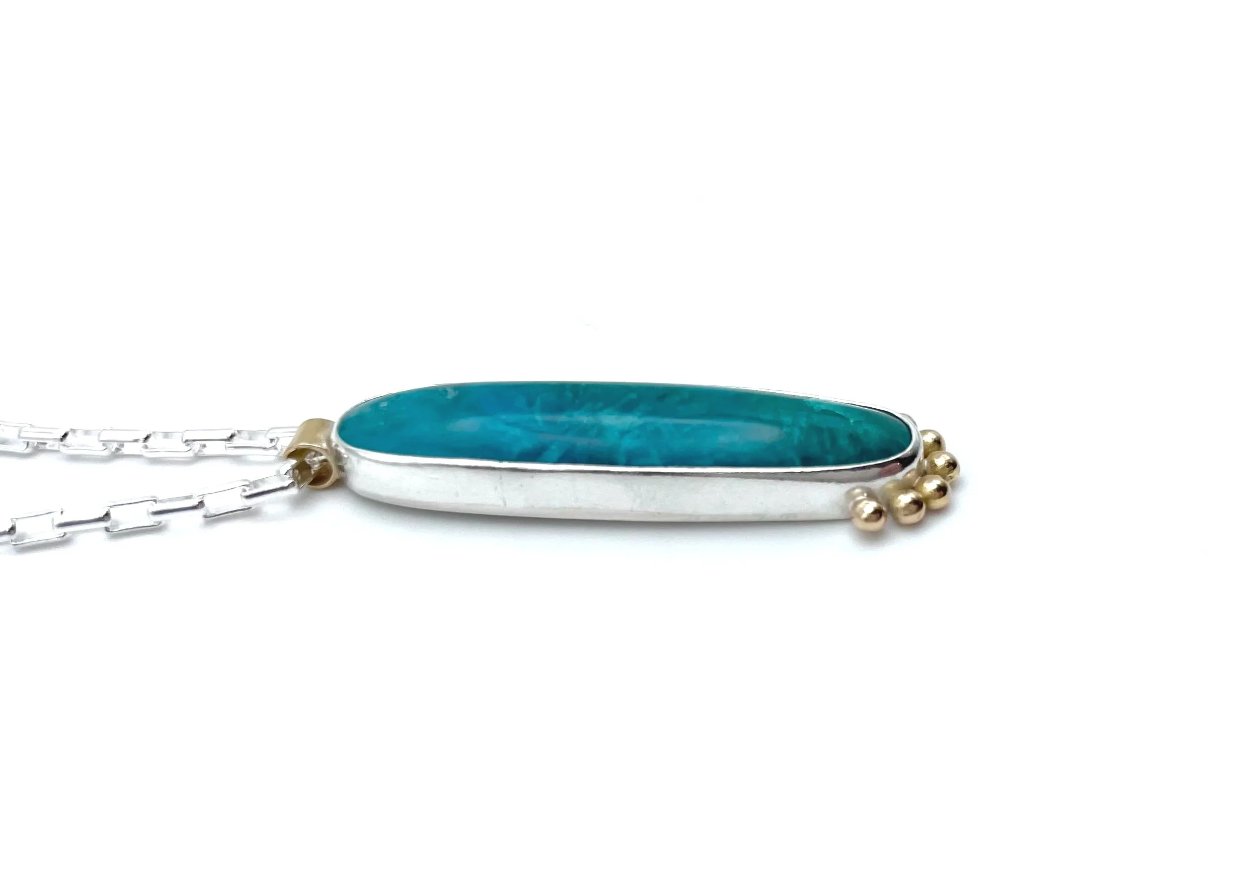 Silver and gem silica saganite pendant necklace with gold accents