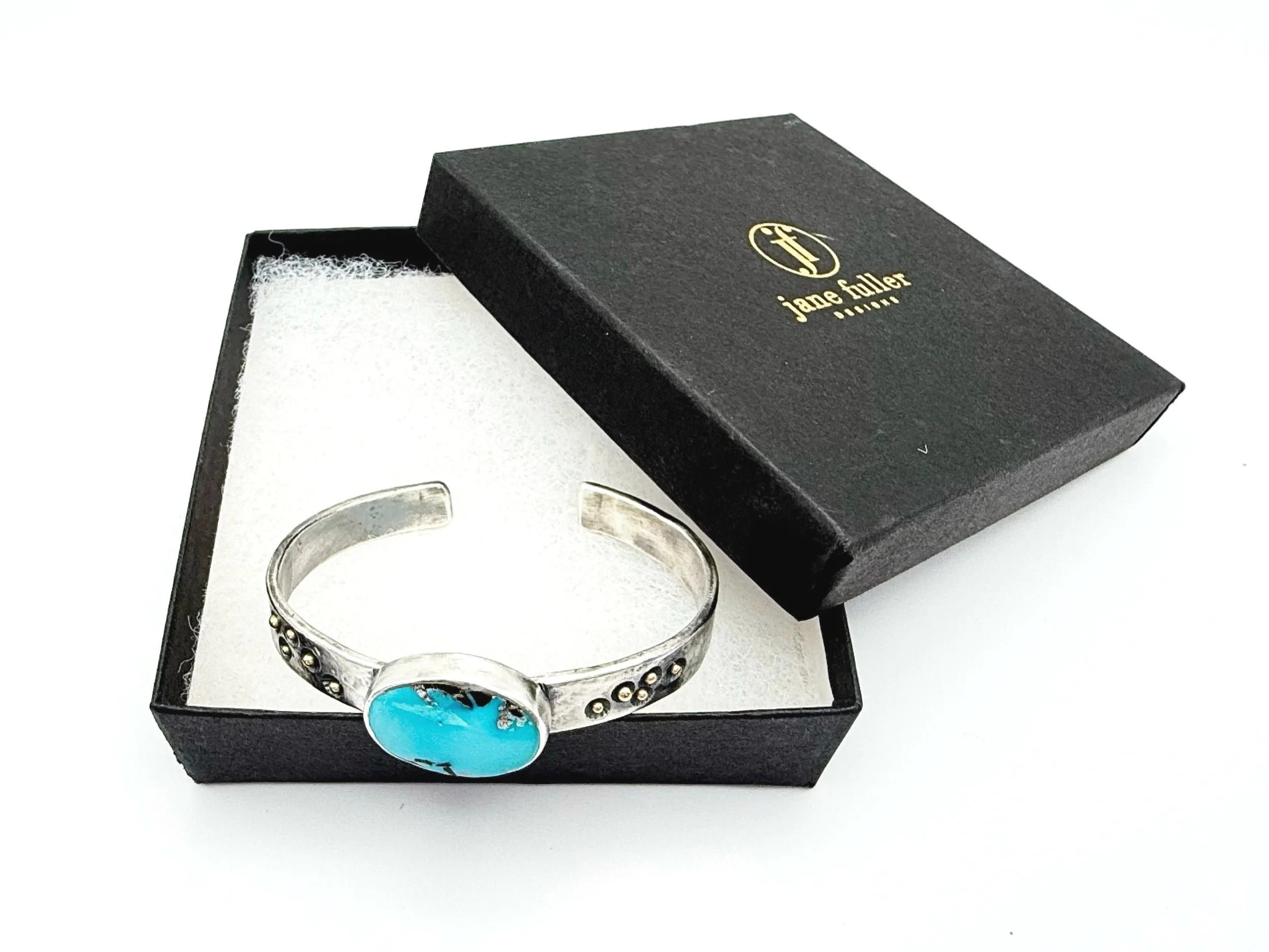 heavy silver turquoise cuff bracelet with 14k gold