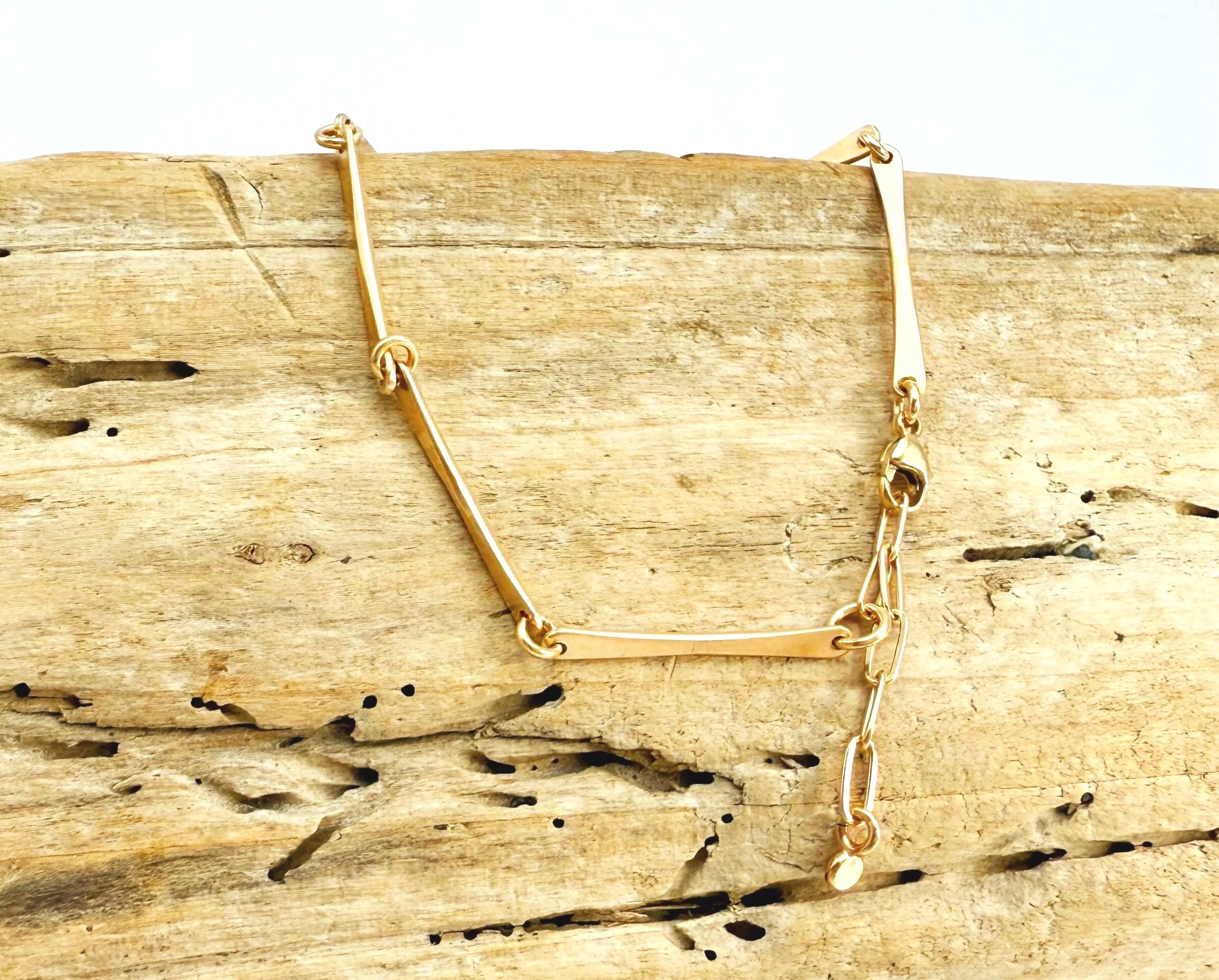 Artisan made hammered bar bracelet in 14k yellow gold