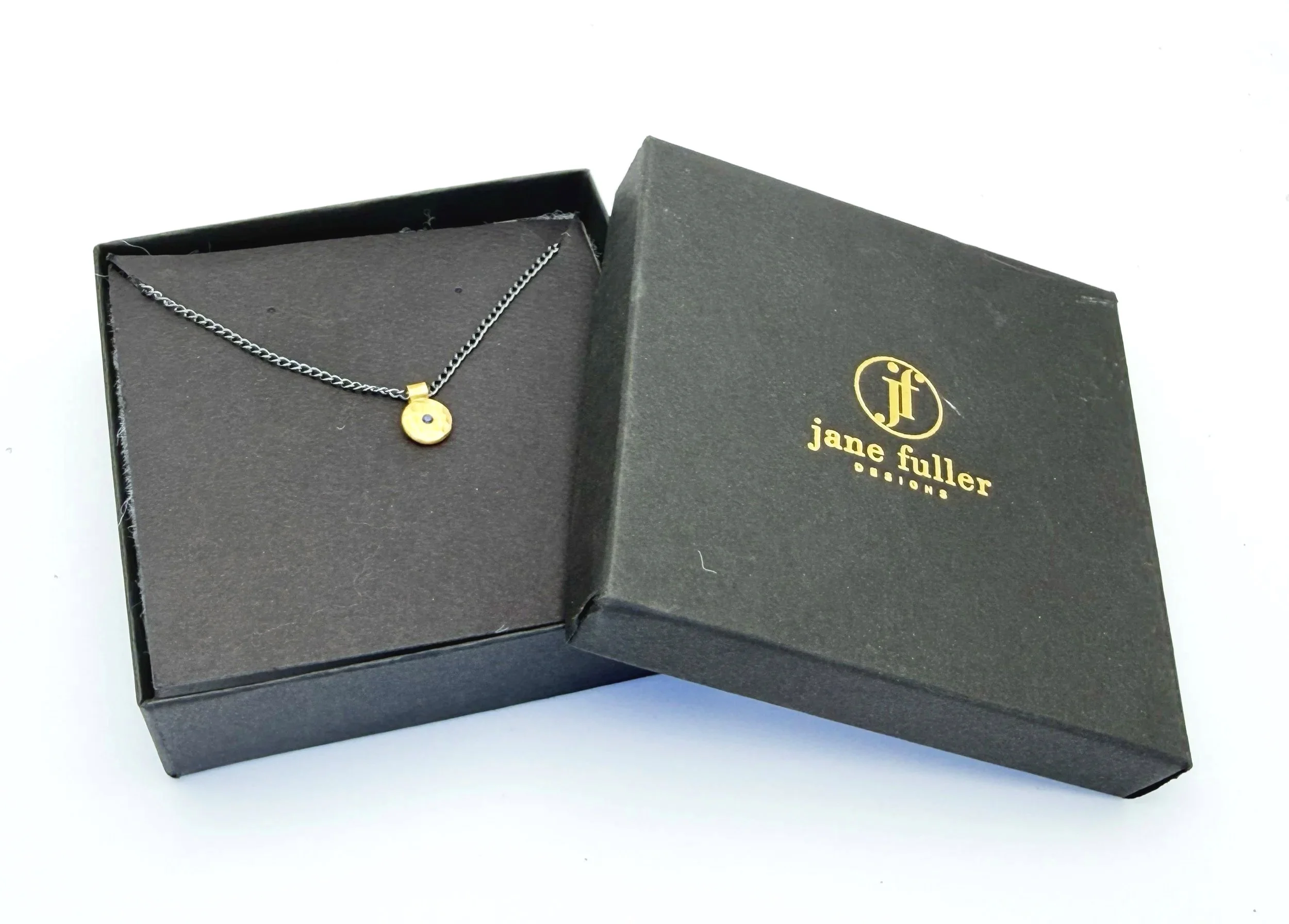 18k gold disc necklace in a Jane Fuller Designs gift box