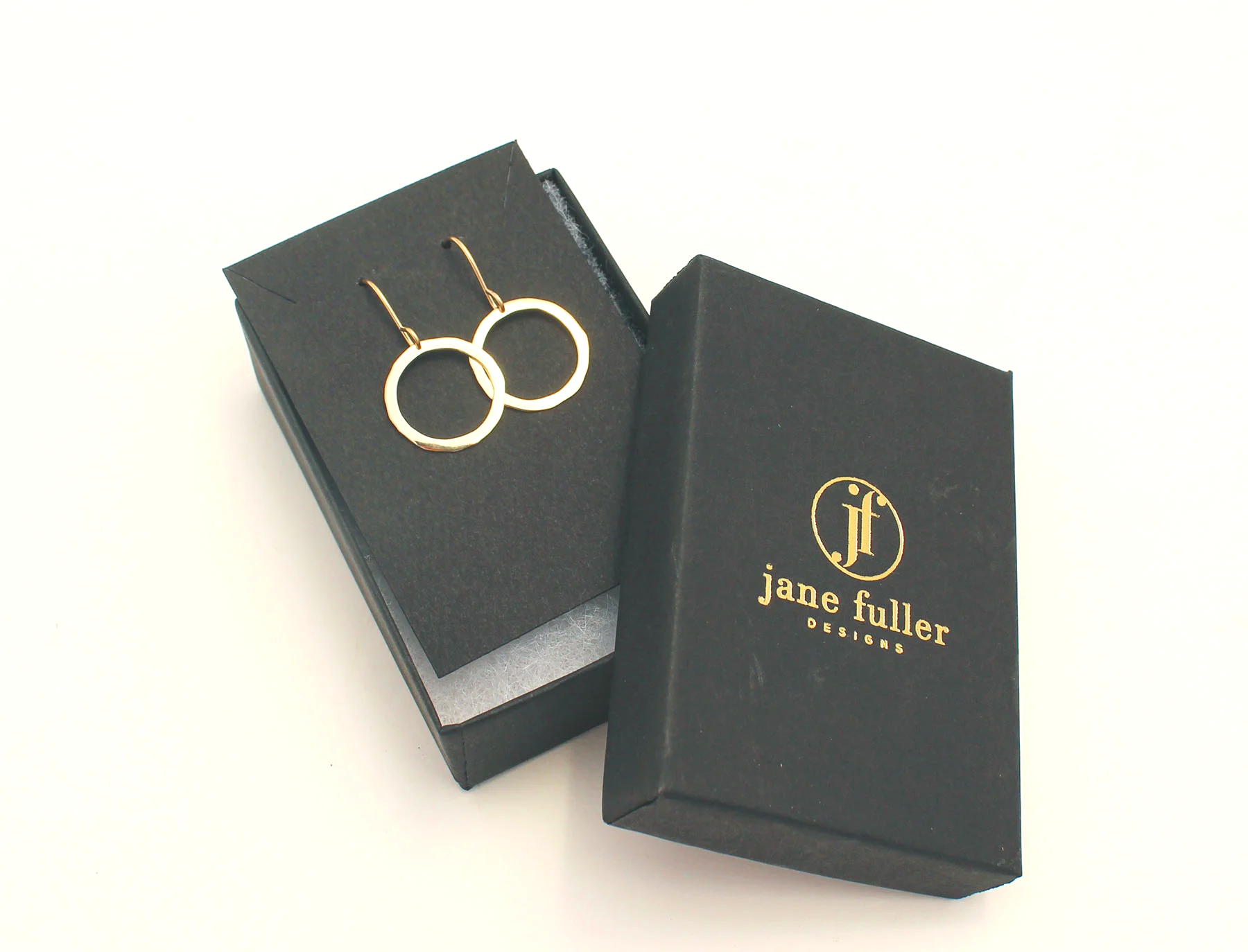 medium sized polished solid gold hoop earrings 14k