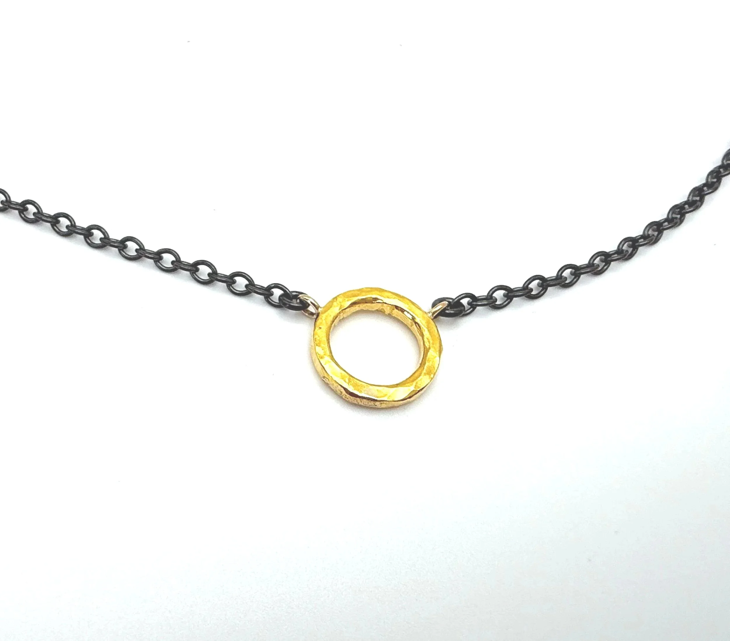 pure gold hammered open circle with oxidized silver chain