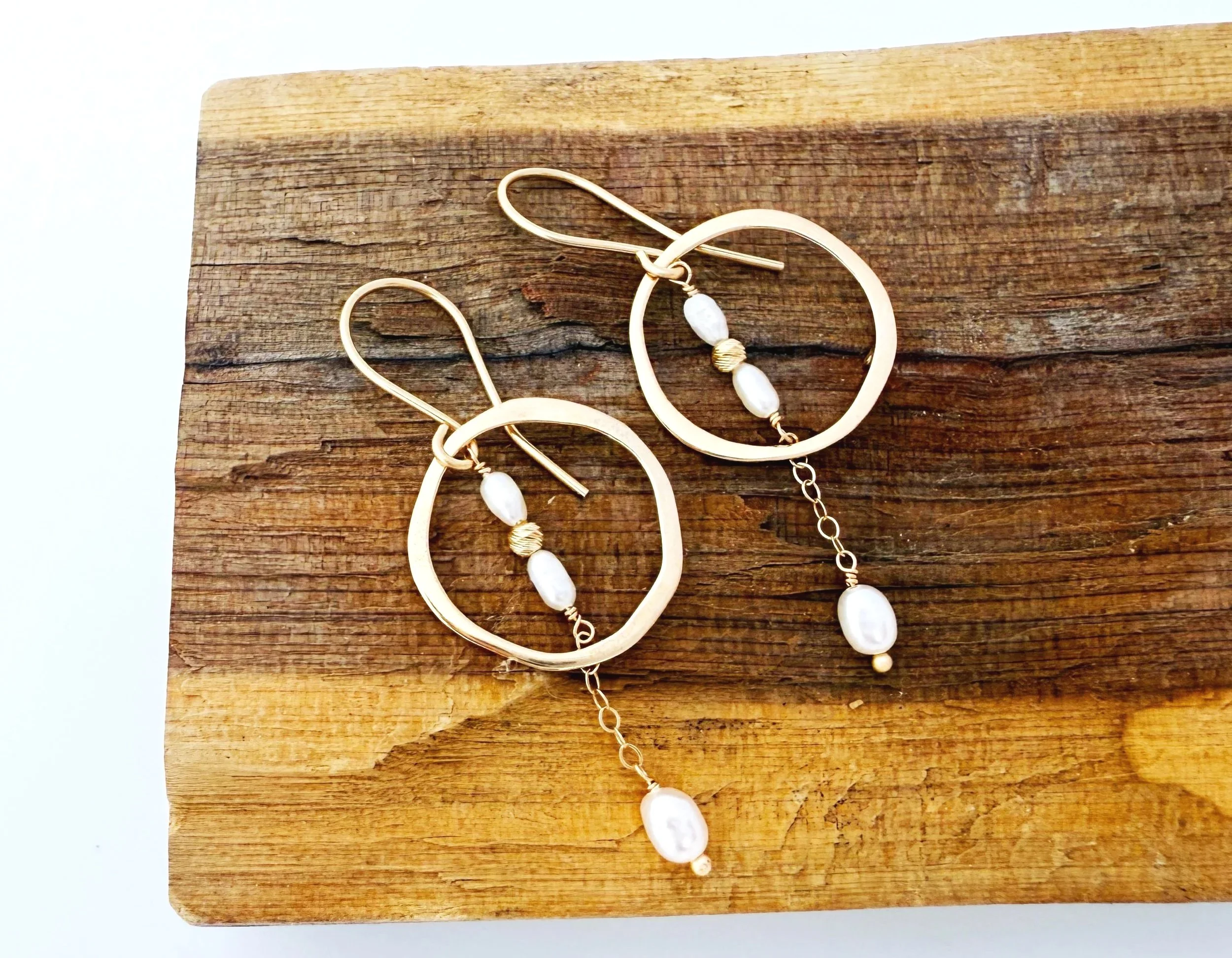 large open circle stud earrings with pearl dangle in 14k gold