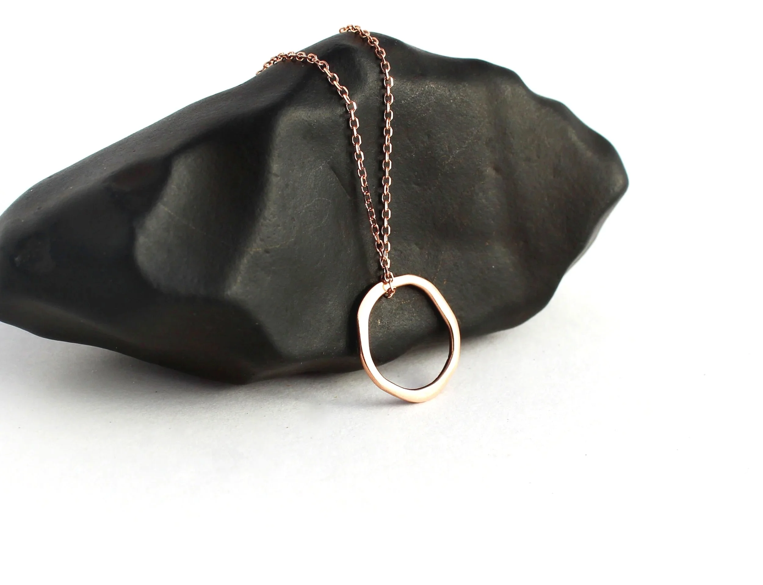 handmade irregular shaped open circle pendant in rose gold 14k