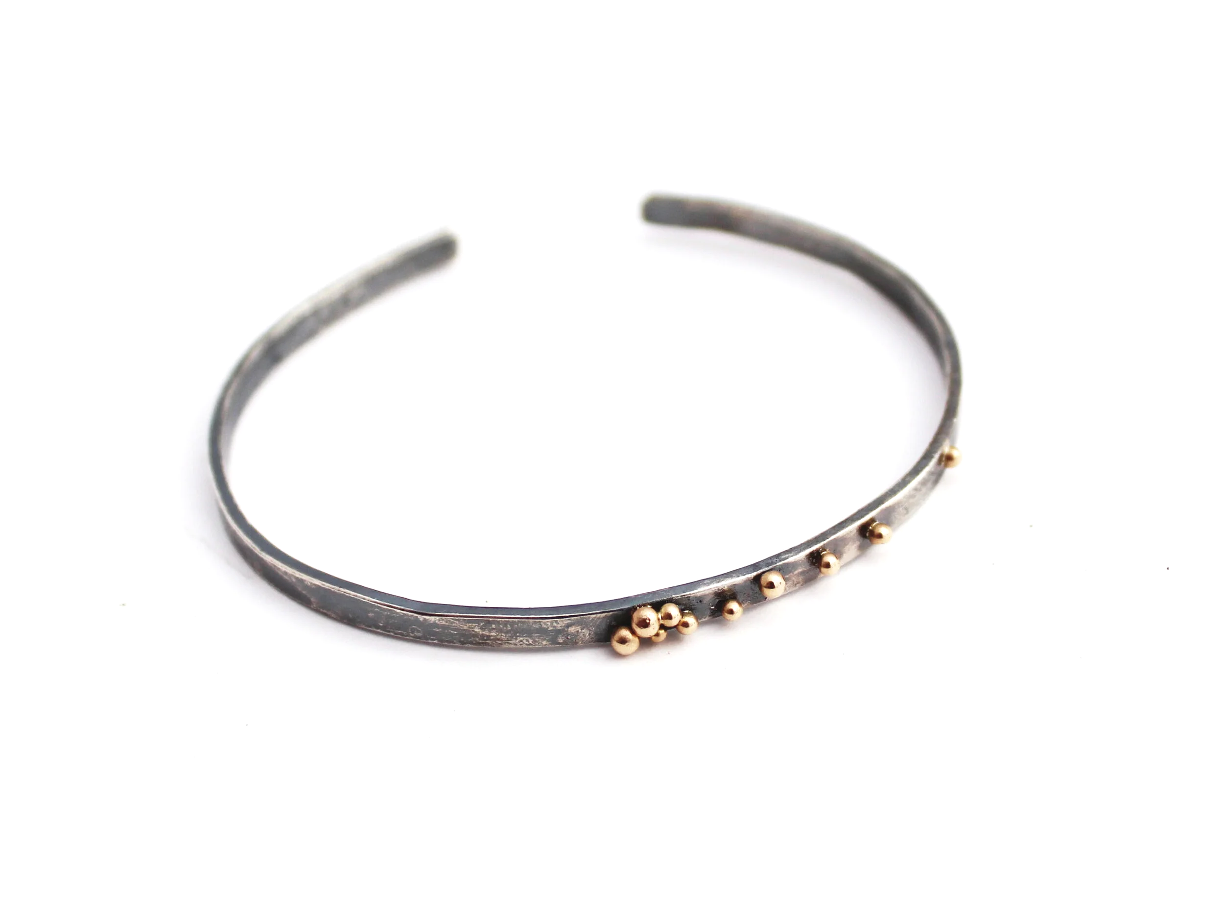 oxidized hammered silver cuff with 14k gold