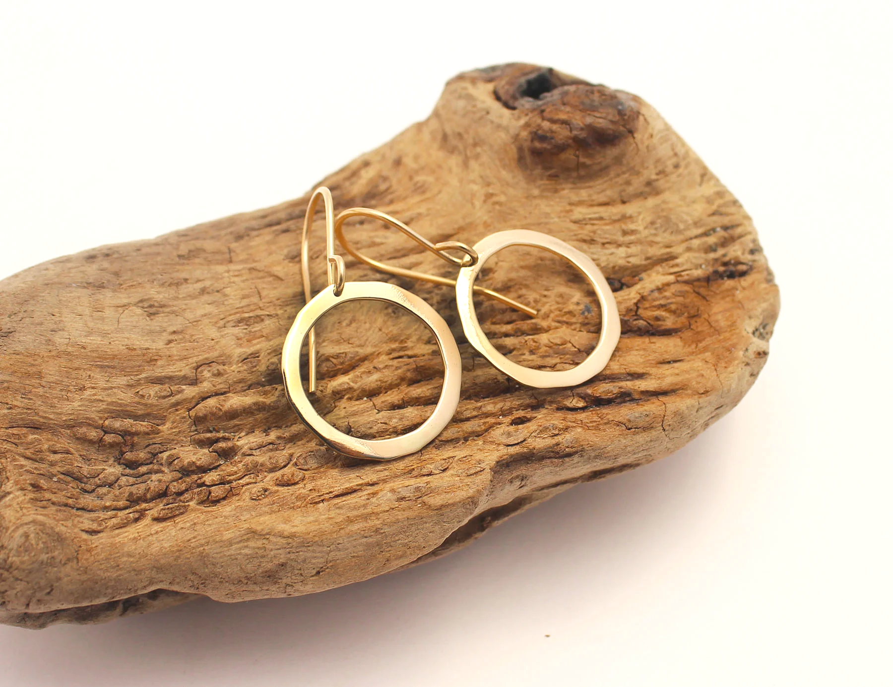 unique handmade medium sized hoops in 14k yellow gold