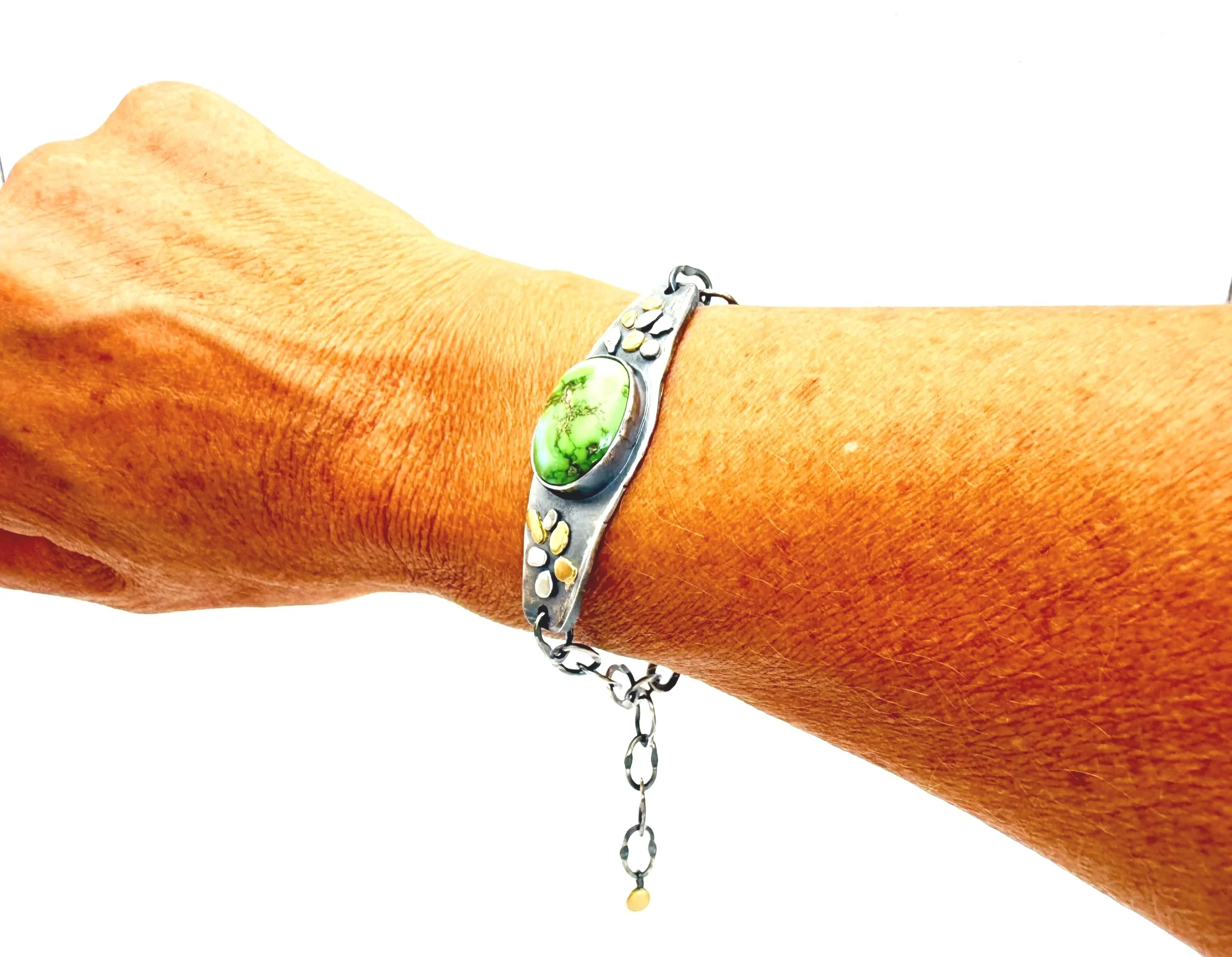 sonoran turquoise silver bracelet with 18k gold accents