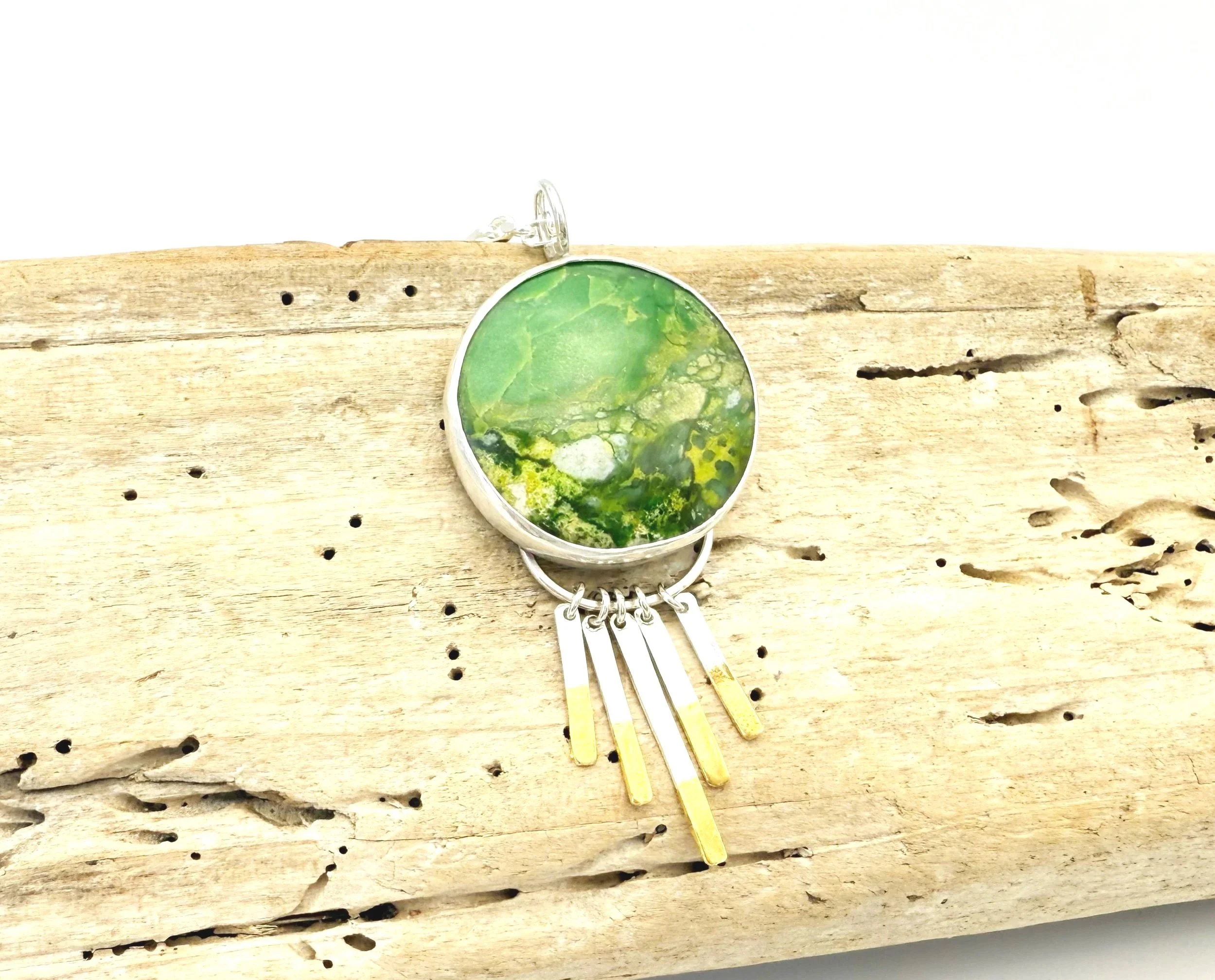 one of a kind large round green stone pendant mixed metal