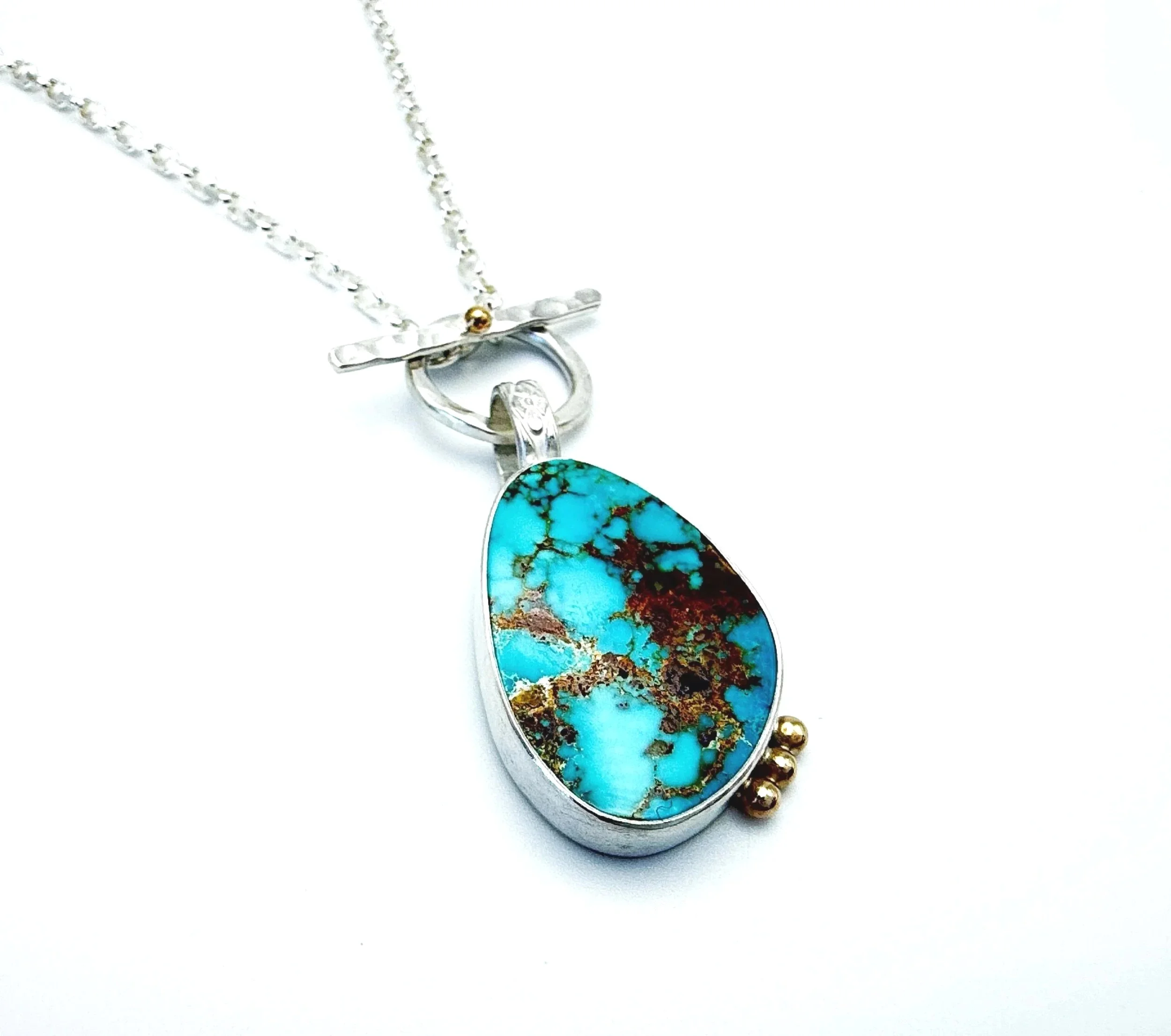 one of a kind turquoise pendant necklace with front clasp