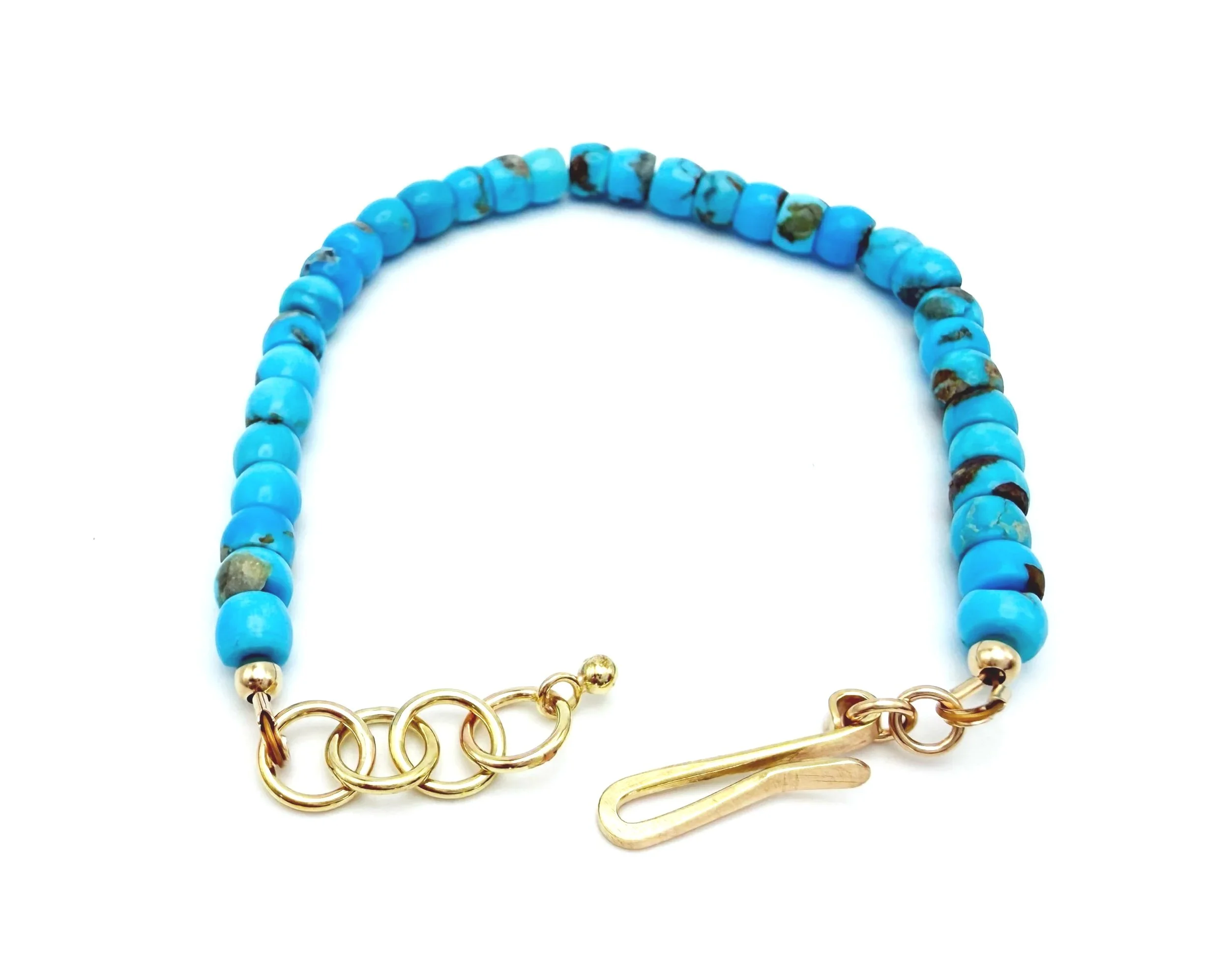 Artisan made large turquoise bead bracelet in solid gold