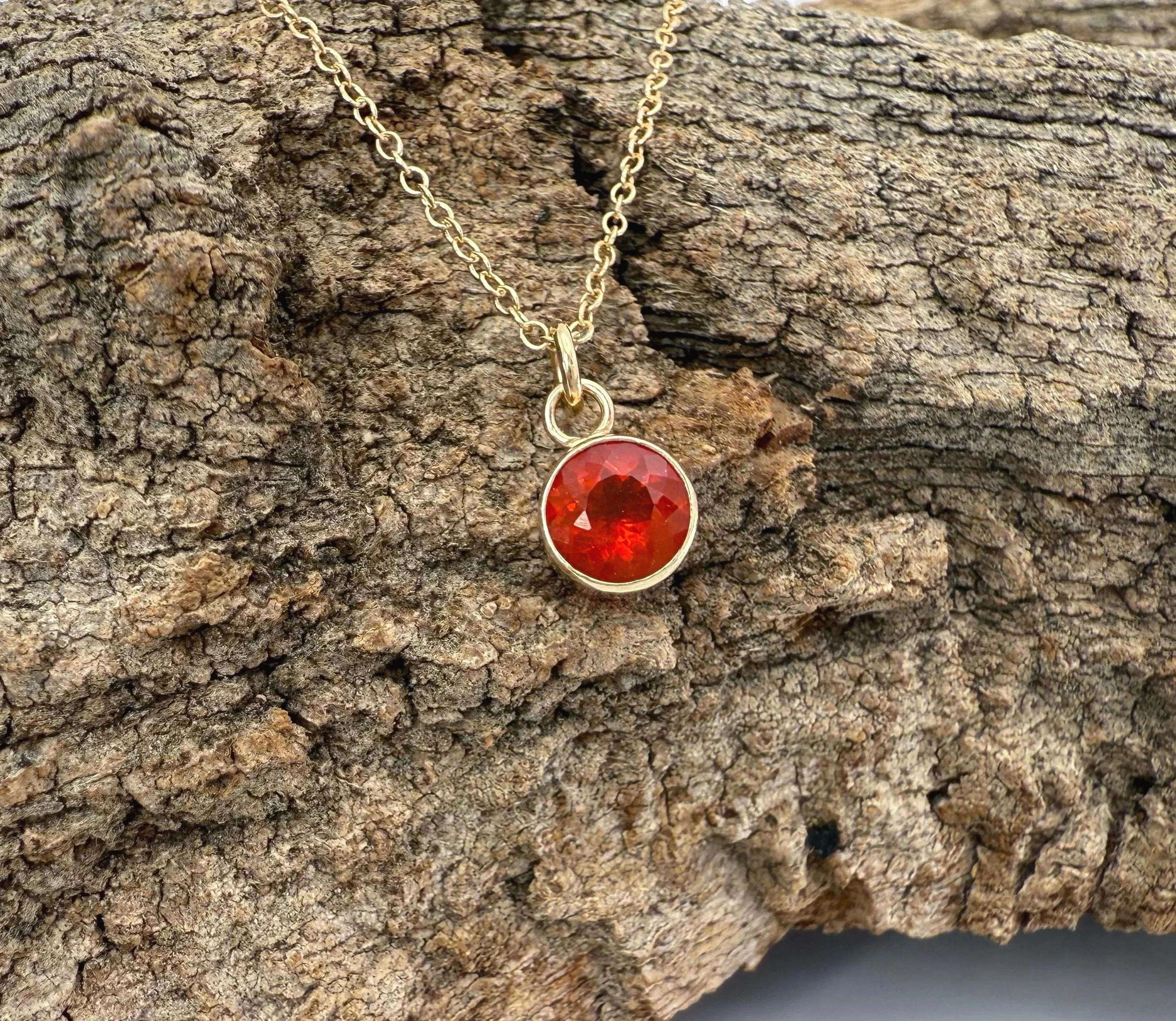 minimalist orange fire opal pendant in 14k gold