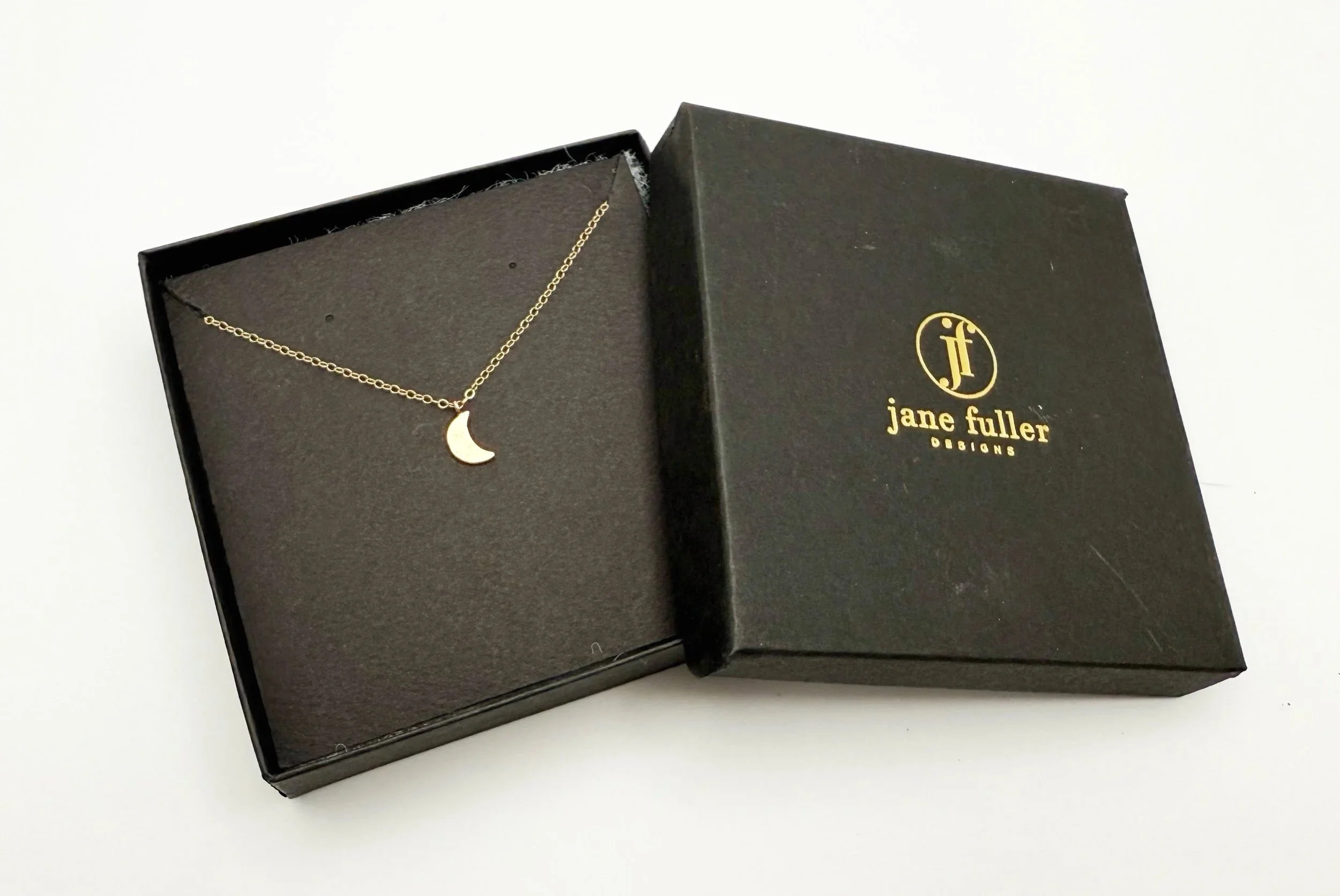 14k solid gold hammered moon pendant necklace shown in Jane Fuller Designs gift box