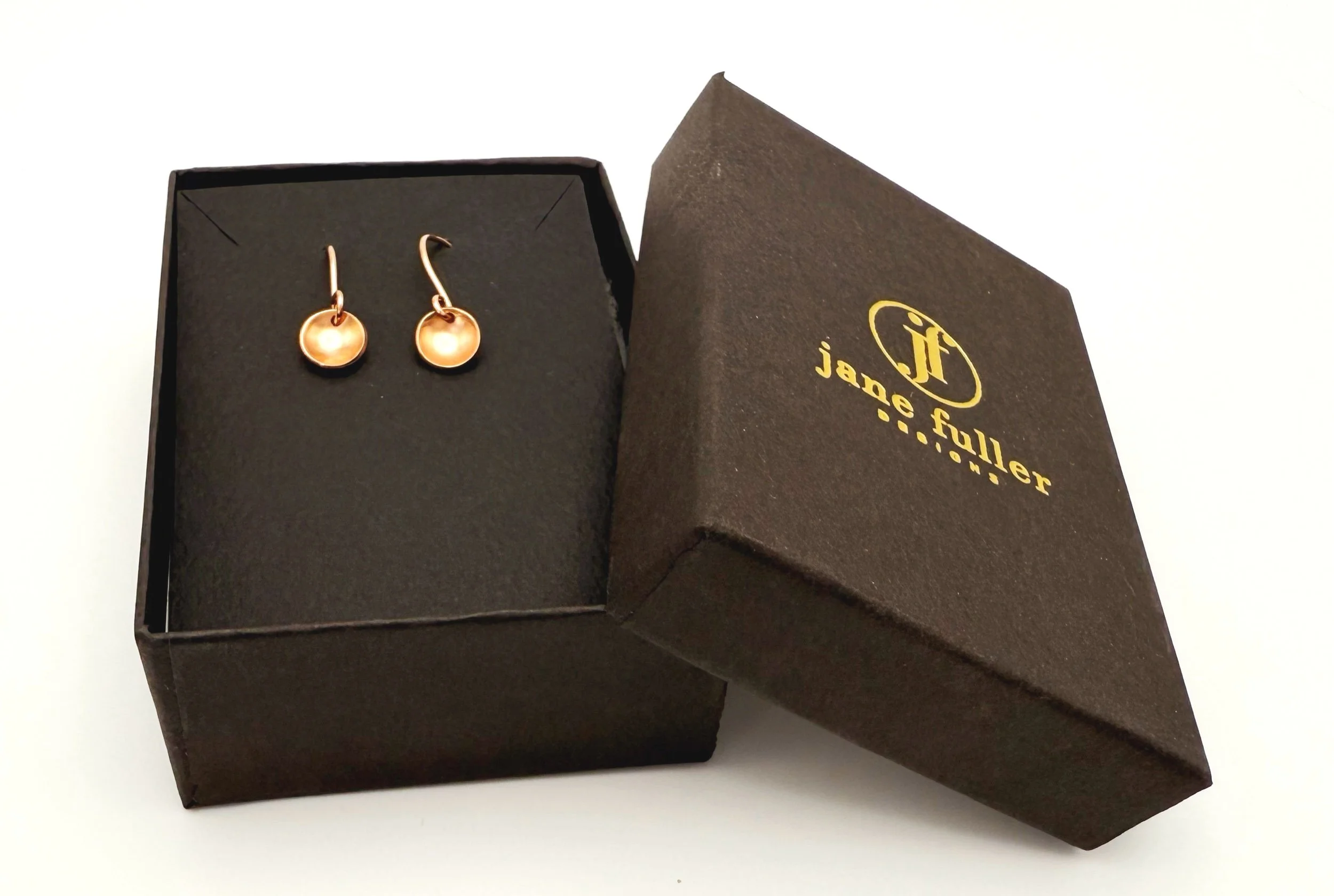 rose gold domed disc earrings shown in Jane Fuller Designs gift box