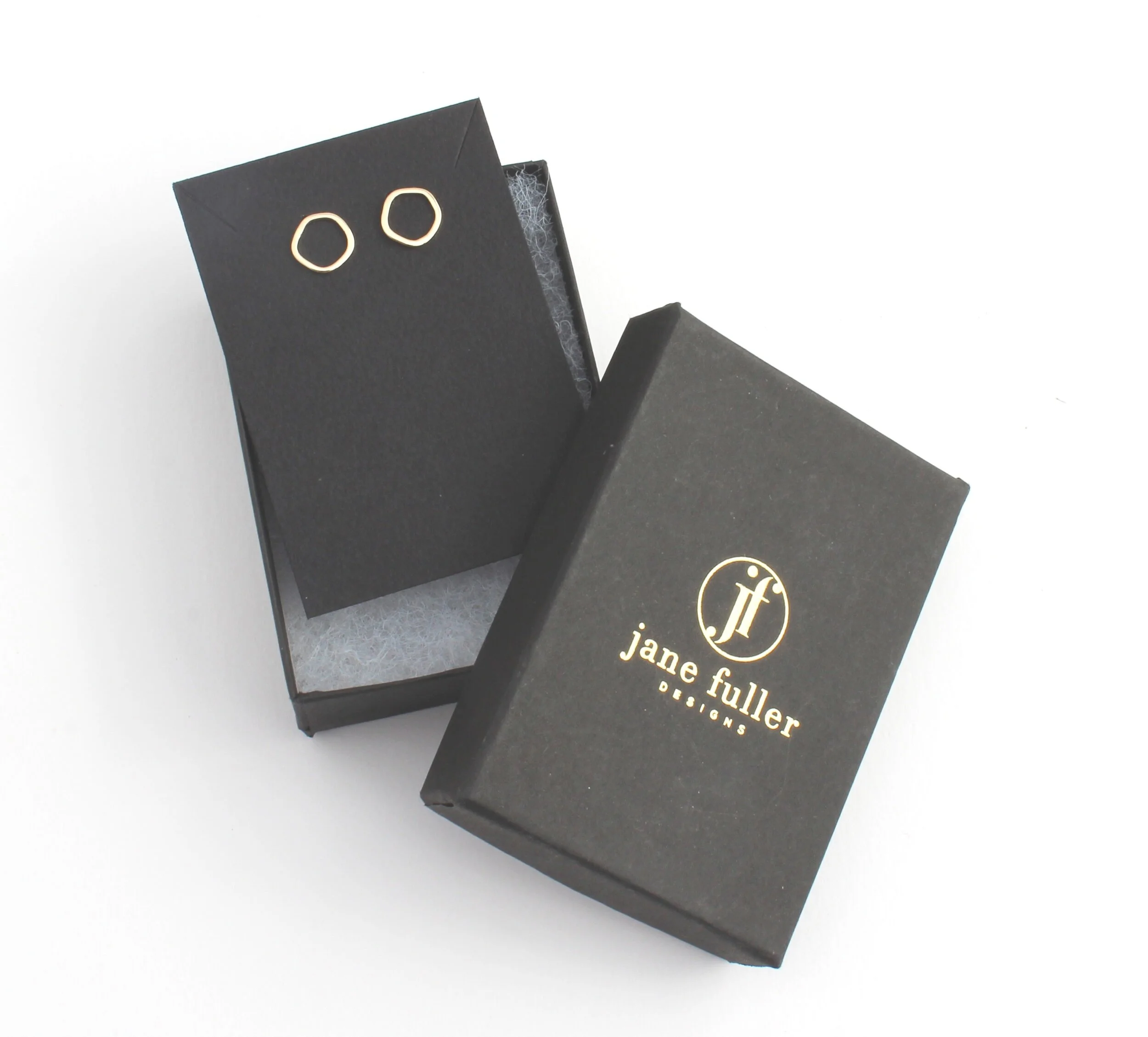 circle stud earrings irregular shape in solid gold with butterfly closure
