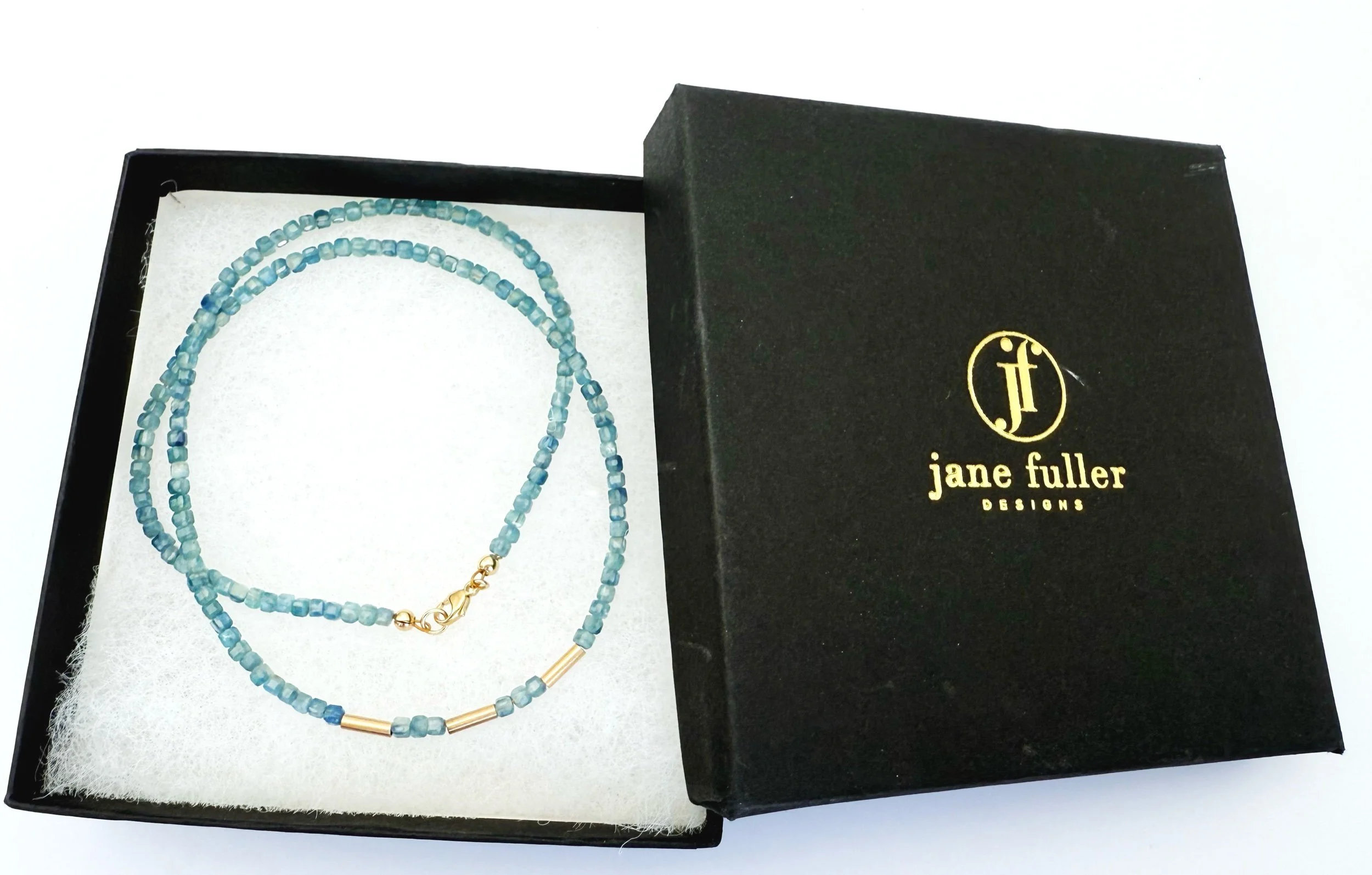 minimalist blue kyanite gemstone bead necklace in 14k gold with lobster clasp