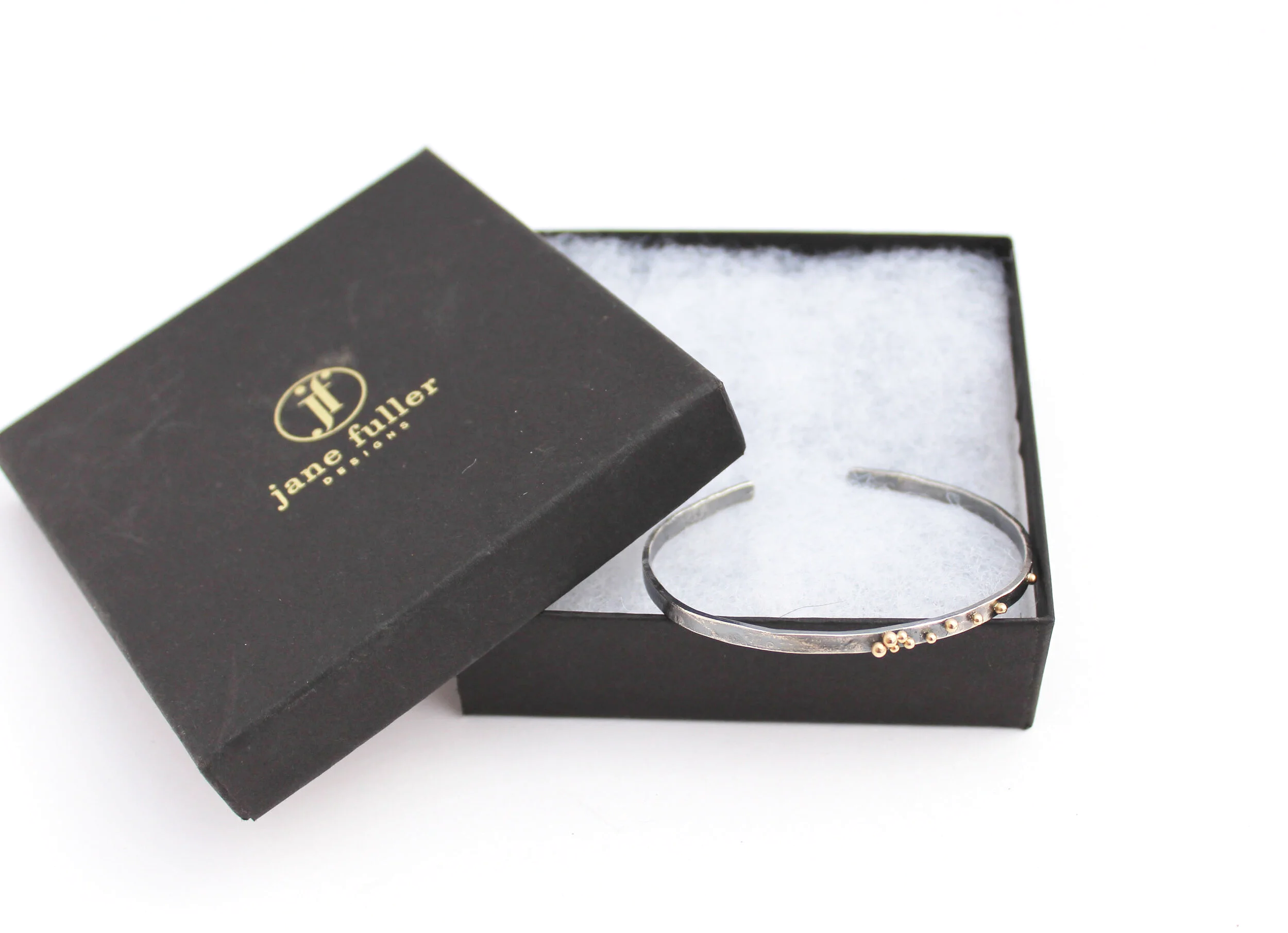 blackened silver cuff with 14k solid gold dots