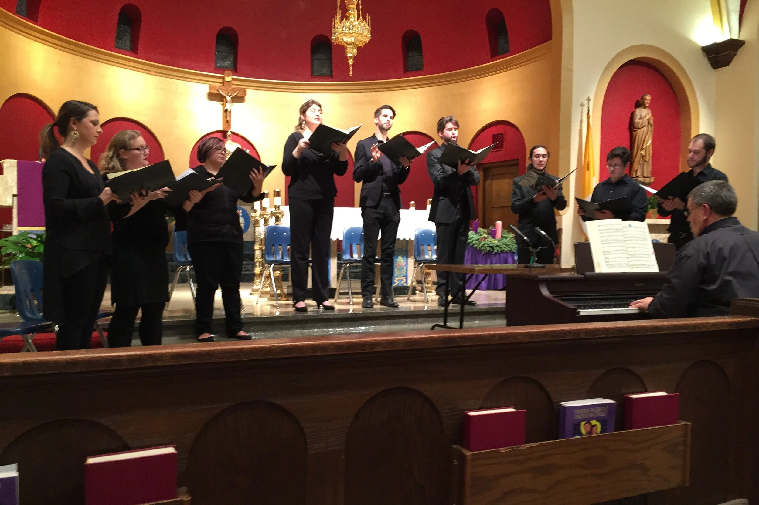 Four soloists and a five-person choir perform Jakub Jan Ryba’s Czech Christmsas Mass in the beautiful sanctuary of St. John Nepomucene Catholic Church in Ennis. Left to right, Julianna Emanski, solo soprano; Amanda Jacobsen, soprano; Francesca Cacal, alto; Hannah Ceniseros, solo alto; Barrett Radziun, solo tenor; Brock Johnson, solo bass-baritone; Santiago Gutierrez Herrera, tenor; Hastings Reeves, bass; Lance Russell, base; and Dr. Thomas Sovik on keyboard.