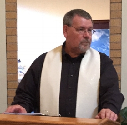 The Reverend Dr. Thomas Sovik, officiant.