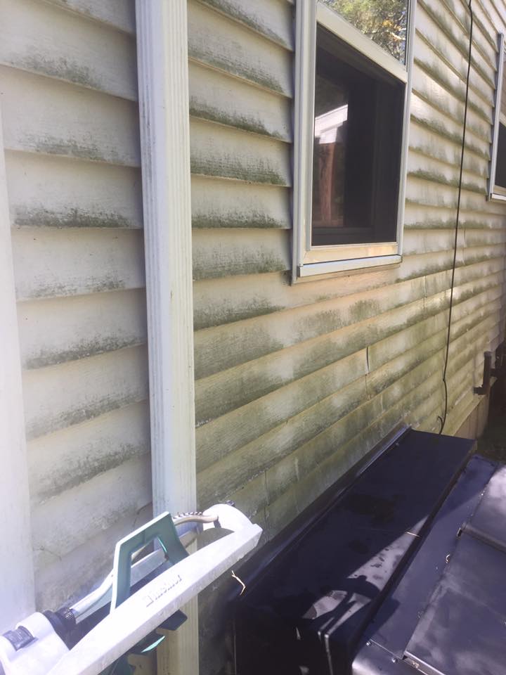 A picture of a home before we used our Soft House Washing process in Killingly, CT!