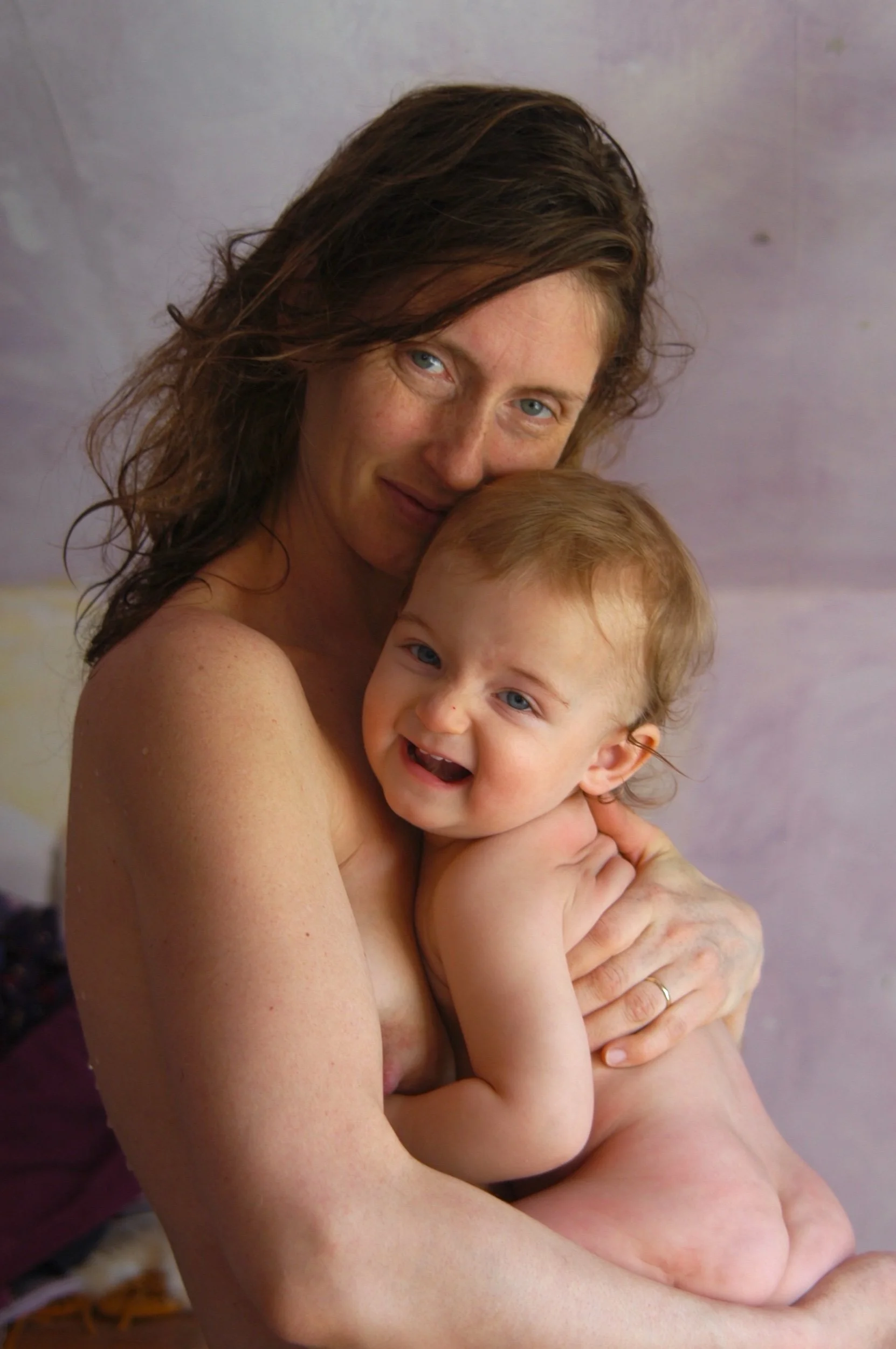 The Artist, Me, holding our daughter, Natasha Star Wedd, seventh baby born at home in water 