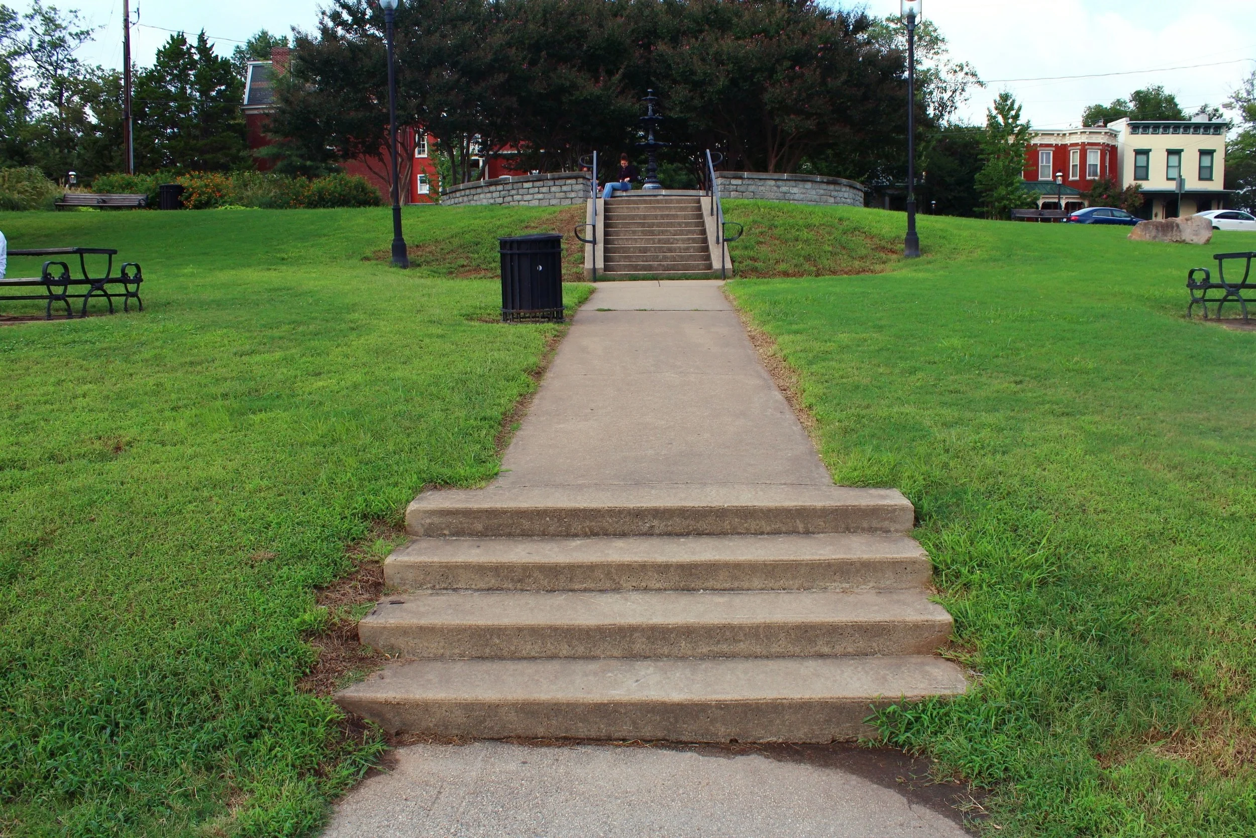 The fountain on axis with the meandering pathway, overlooking the James River.