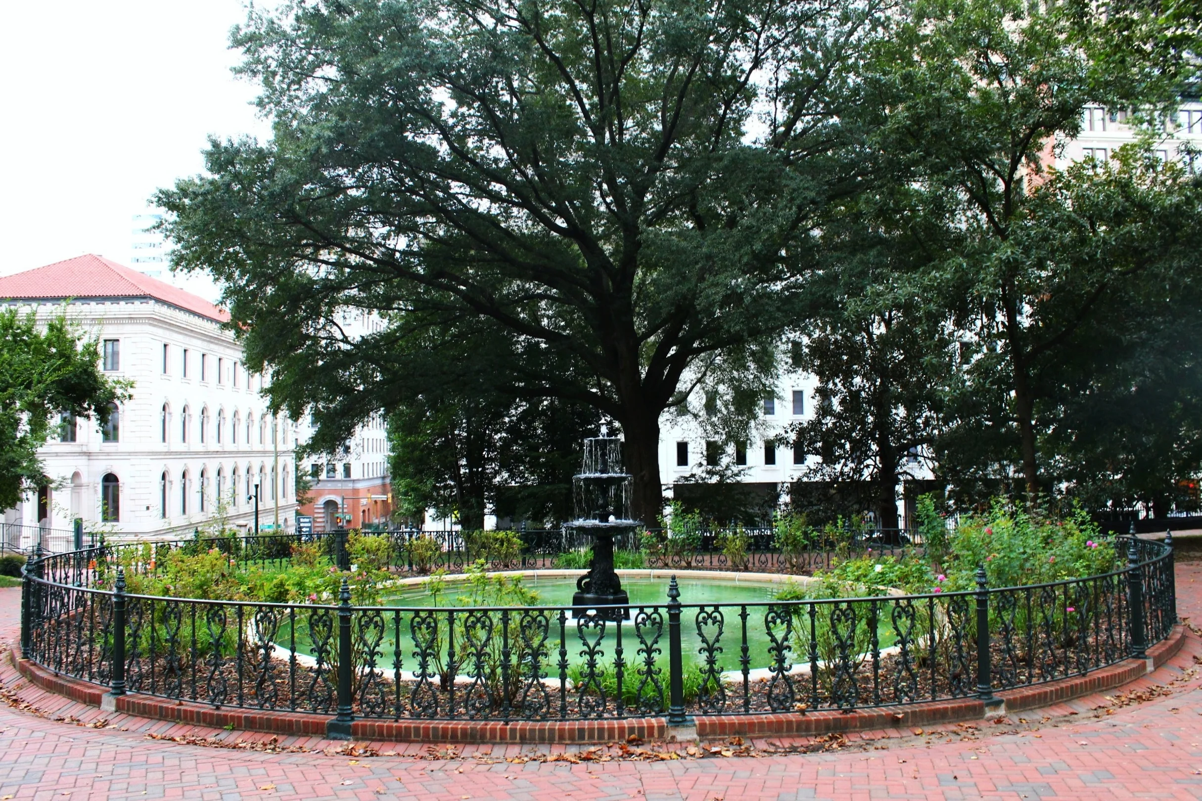 The classic black fountain provides visual and vocal interest of water, especially placed the entrance with heavy vehicle traffic to reduce the noise to an extend. Coupled with classic dark metal fence, this focal point provides a great point of int…
