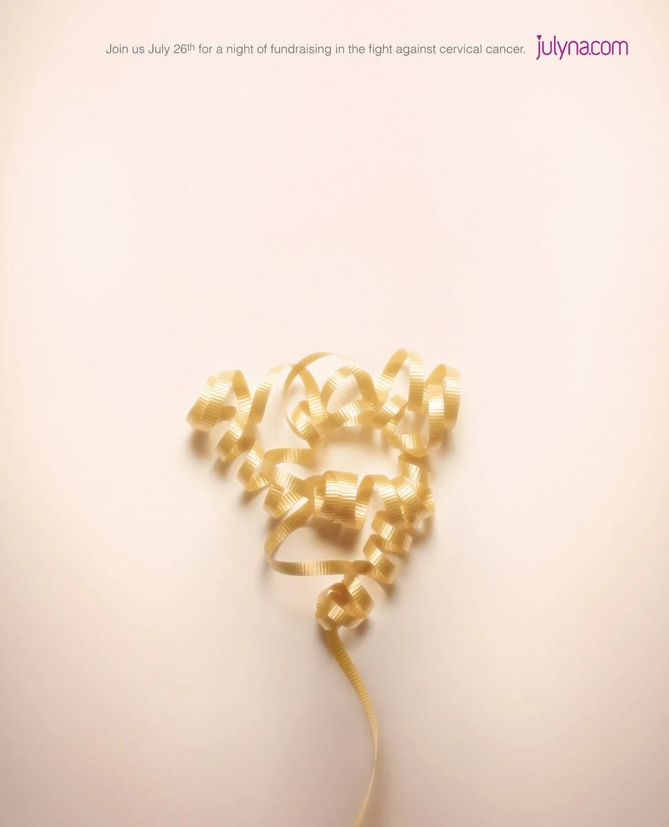  Title: Ribbon  An evening of bold expression, community spirit, and important awareness. Julyna, a non-profit and the women’s answer to Movember, promotes creative grooming throughout July to raise funds and spark conversation about cervical cancer 